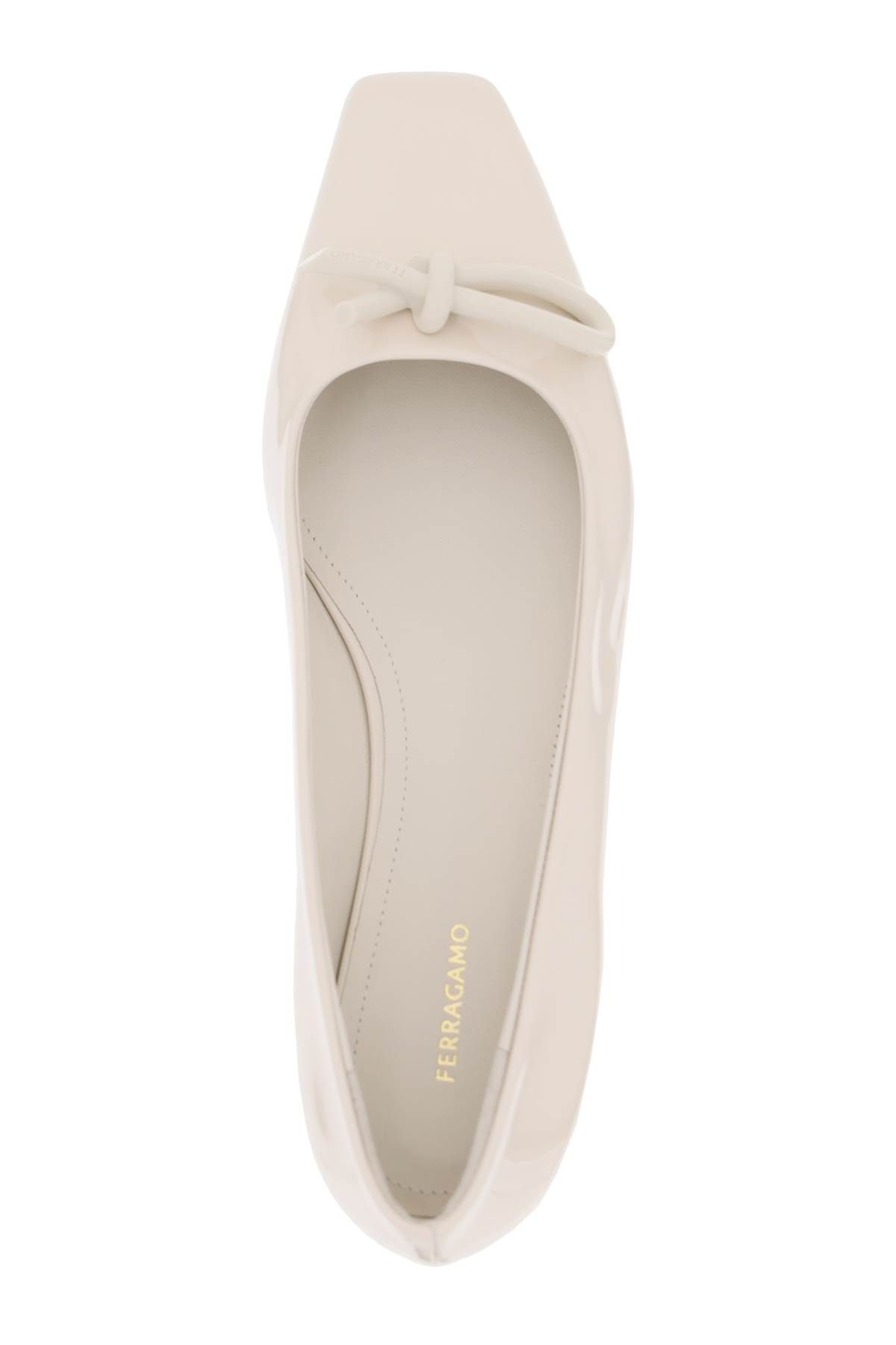 Shop Ferragamo Patent Leather Ballet Flats With Asymmetrical Bow In White