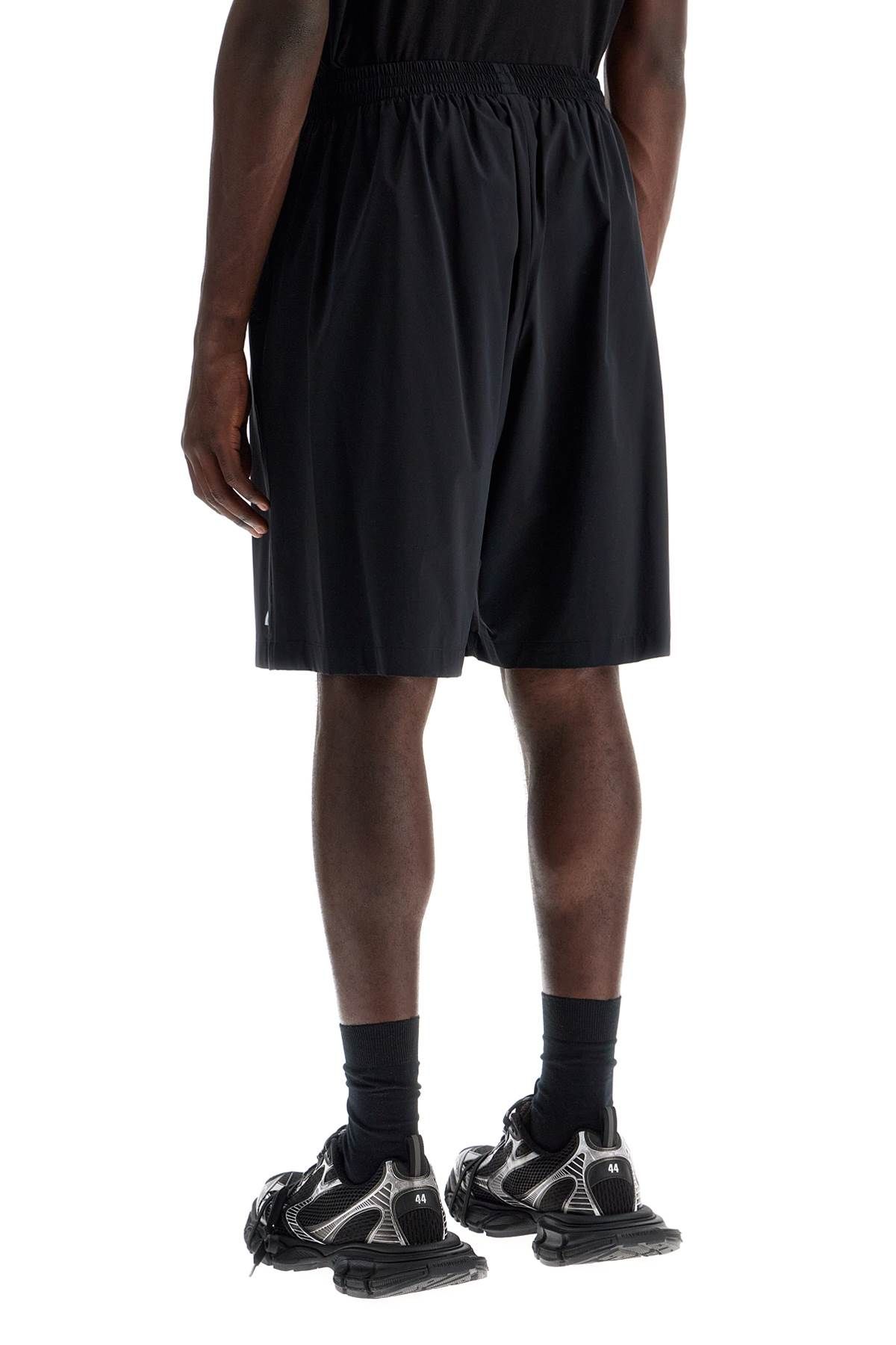 Shop Balenciaga Nylon Stretch Activewear Bermuda Shorts In Black