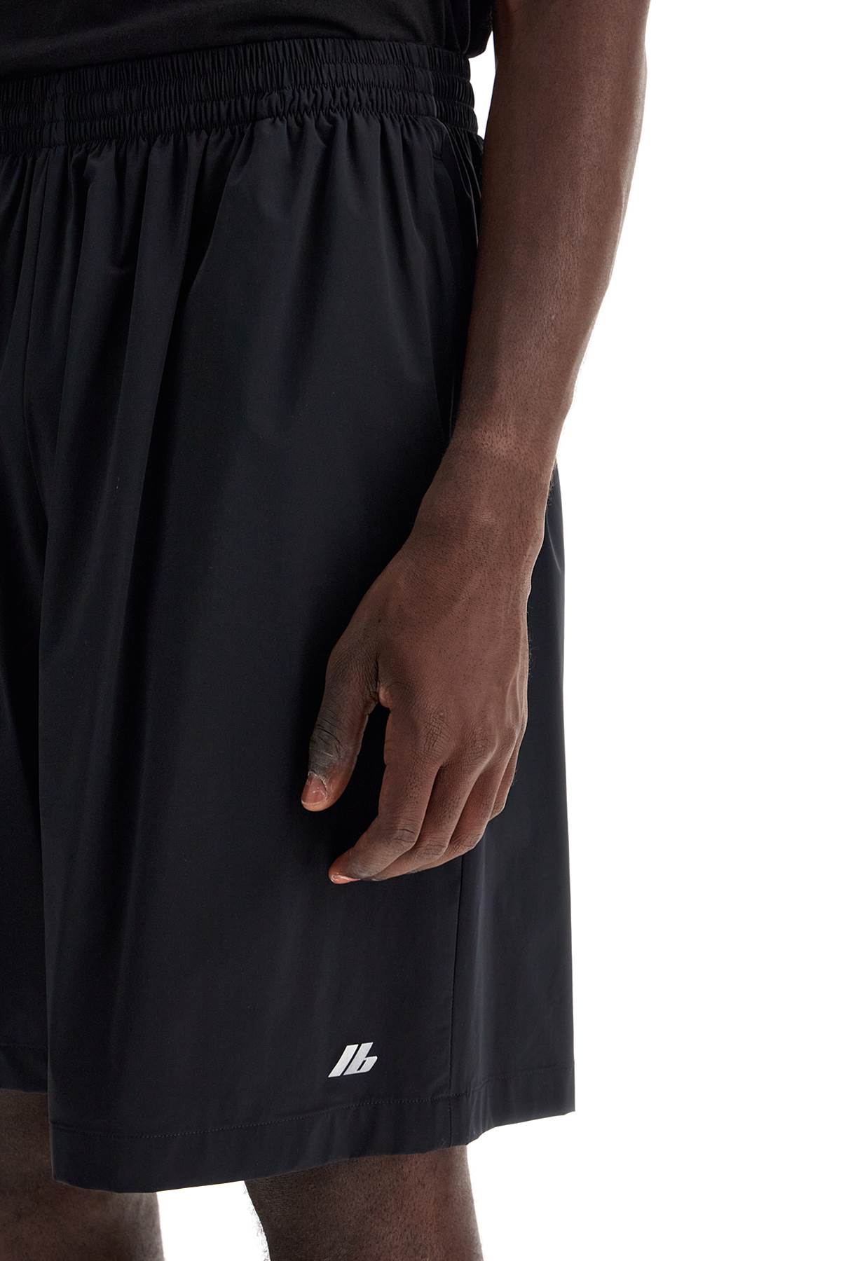 Shop Balenciaga Nylon Stretch Activewear Bermuda Shorts In Black