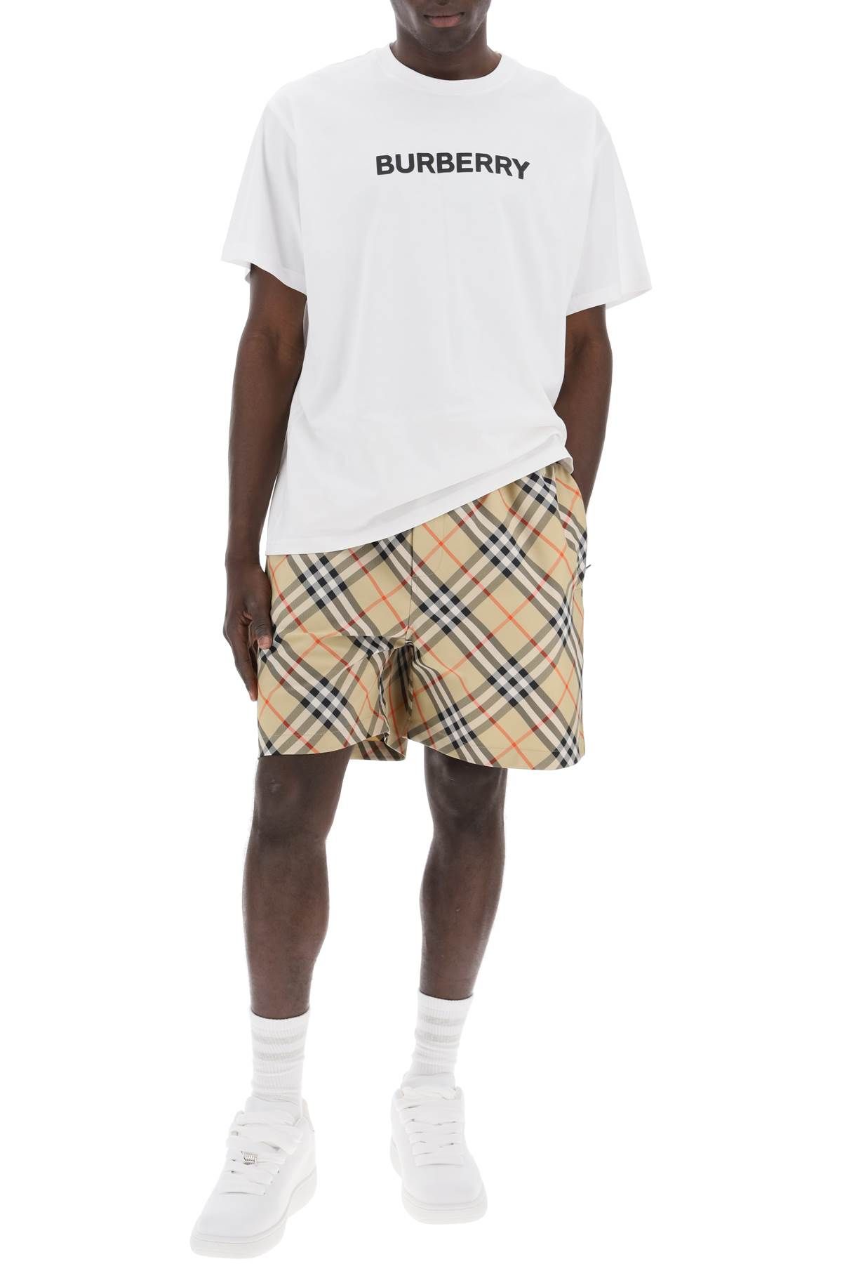 Shop Burberry Checkered Bermuda Shorts In Beige