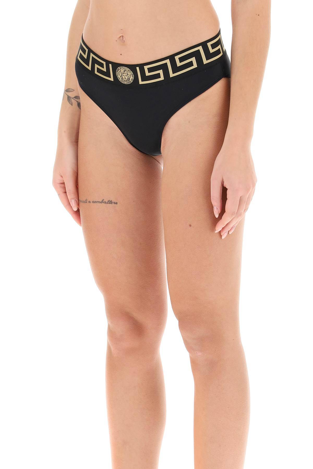 Shop Versace Bikini Bottom With Greca Band In Black