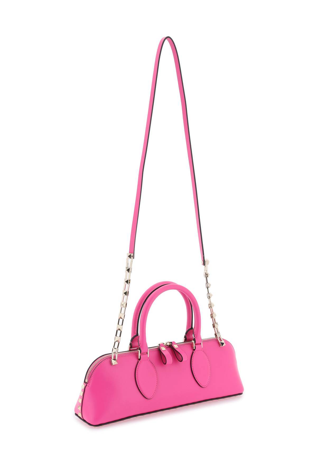 Shop Valentino Rockstud E/w Leather Handbag In Fuchsia