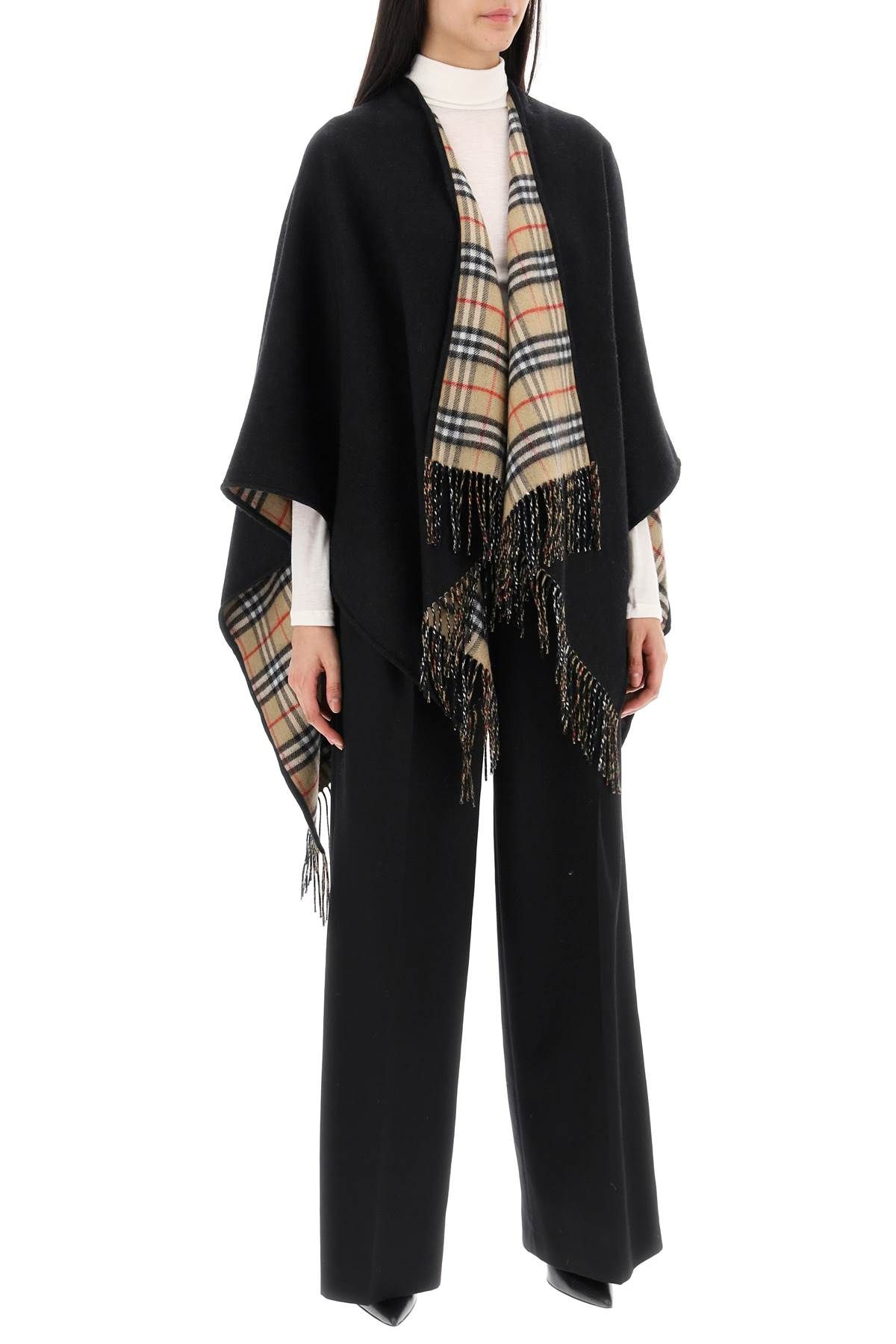Shop Burberry Reversible Wool Cape/pon In Black