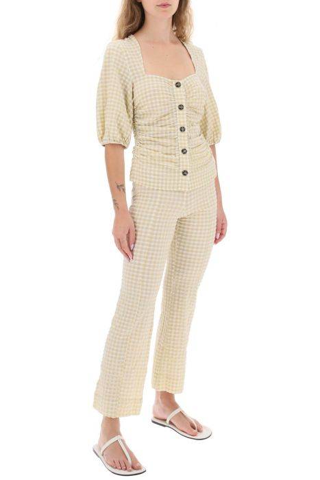ganni flared pants with gingham motif