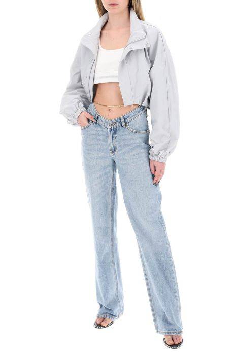 alexander wang jeans con vita asimmetrica e dettaglio catena