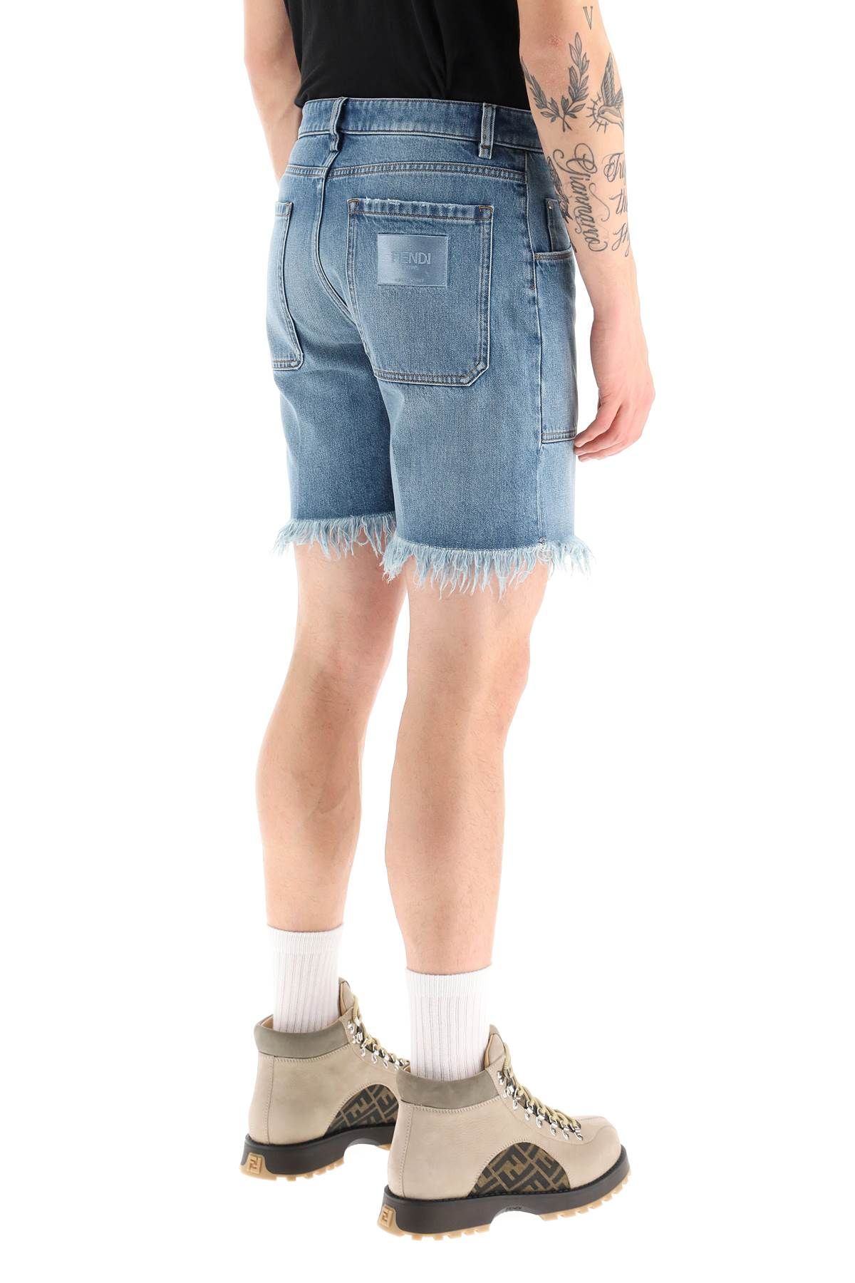 Shop Fendi Denim Shorts With Fringed Hem In Blue