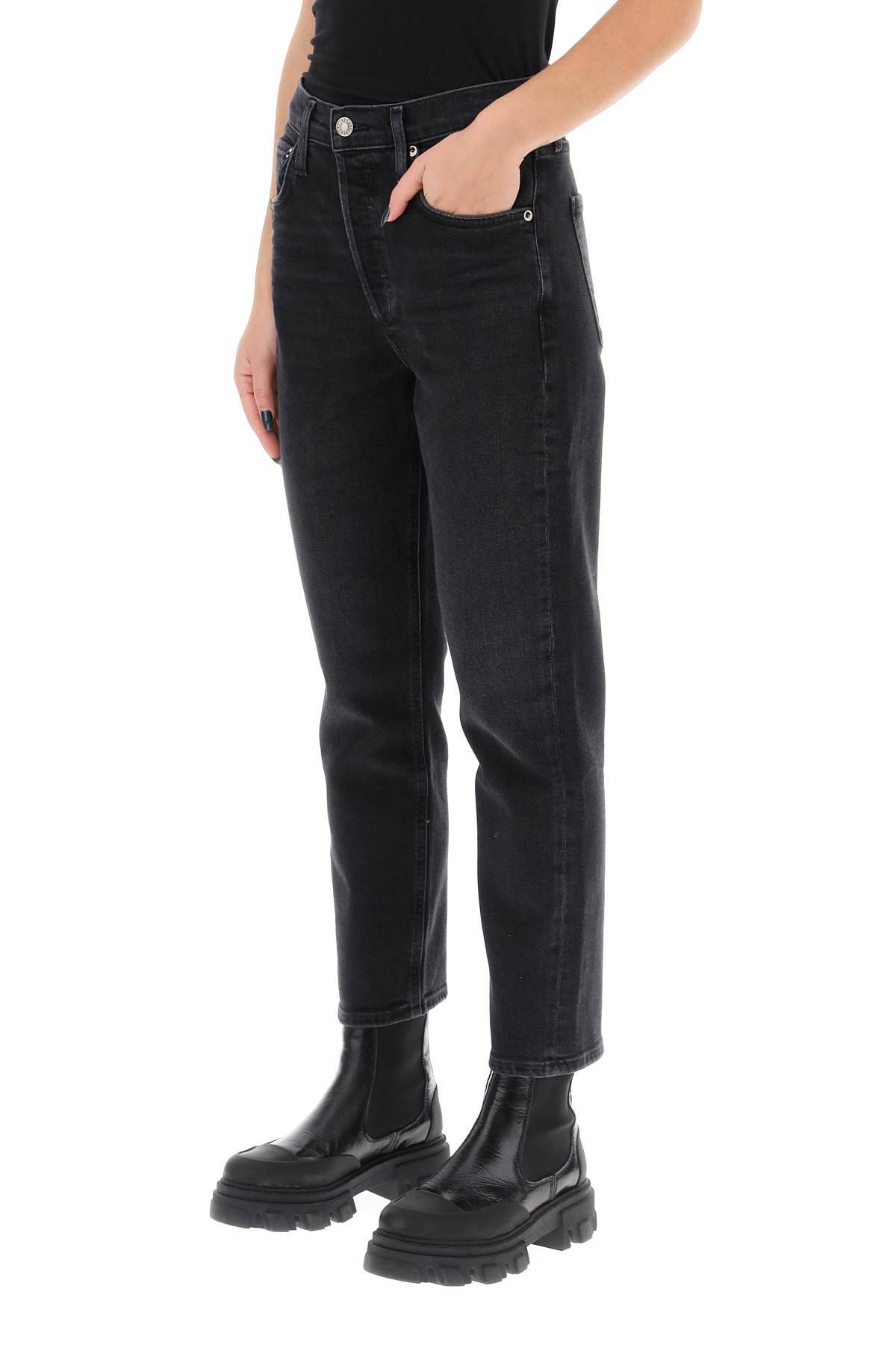 Shop Agolde Riley High-waisted Cropped Jeans In Black