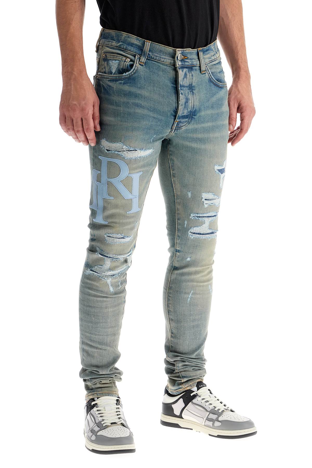 Shop Amiri Leather Logo Jeans With Eight Words In Blue