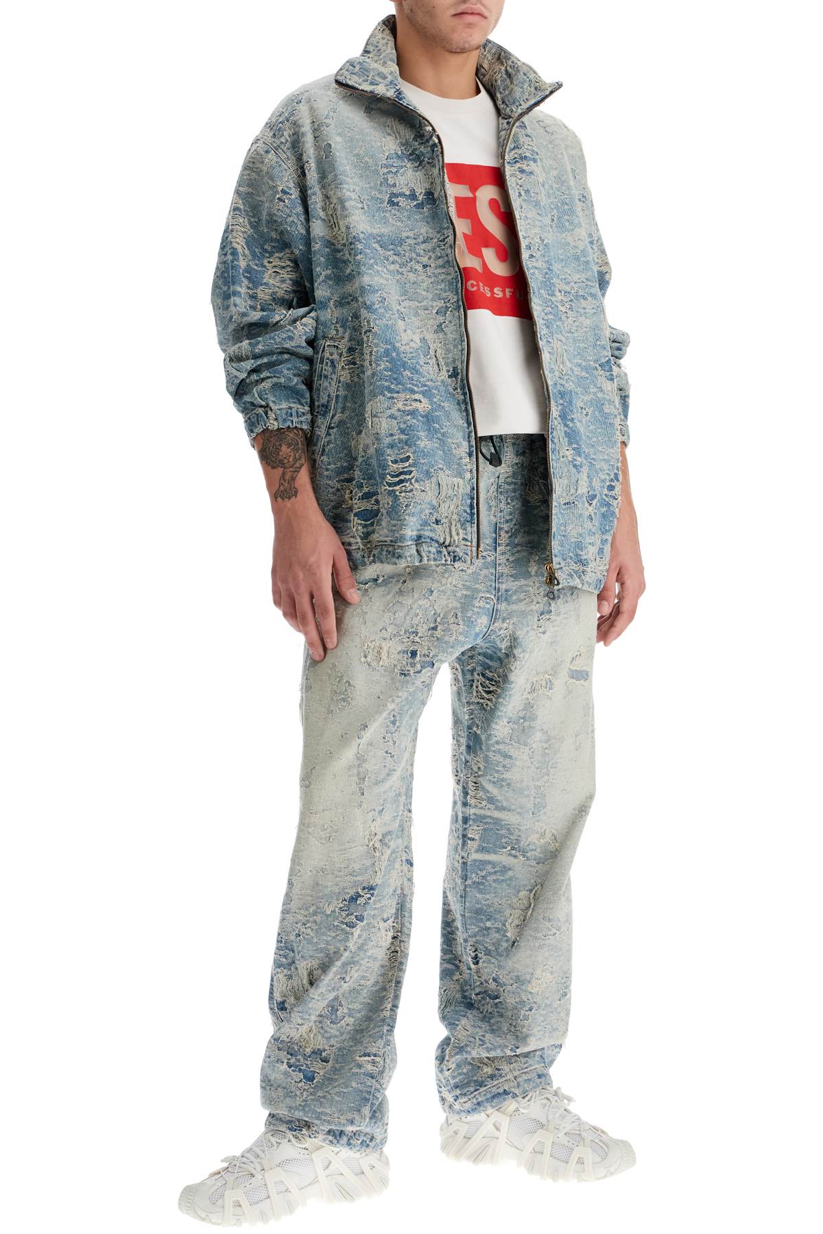 Shop Diesel Distressed Denim Jacquard Pants In Blue