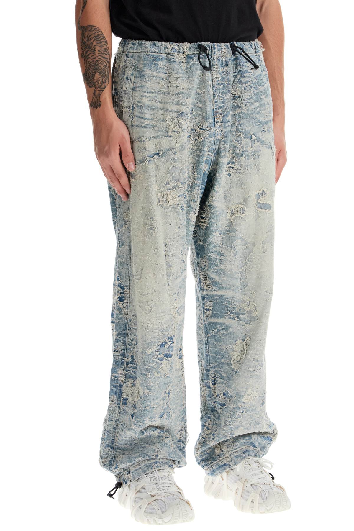 Shop Diesel Distressed Denim Jacquard Pants In Blue