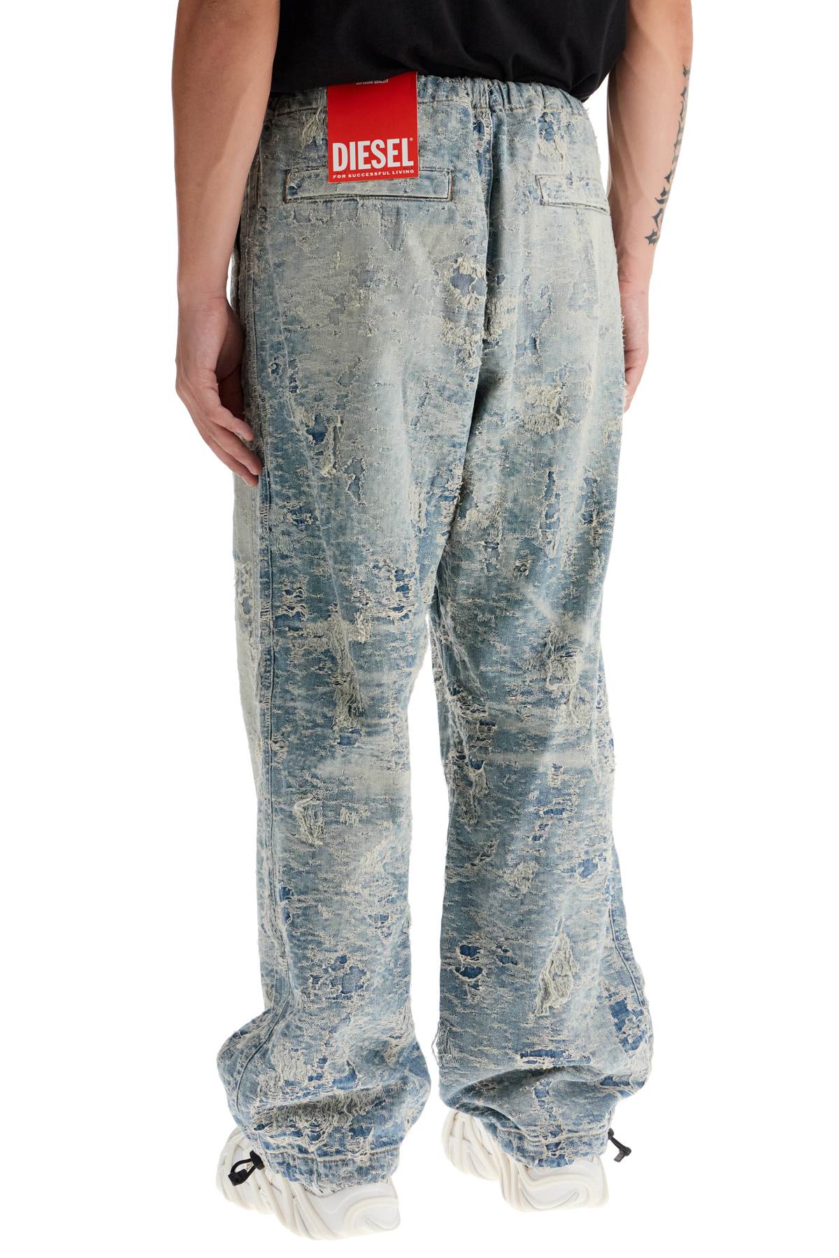 Shop Diesel Distressed Denim Jacquard Pants In Blue