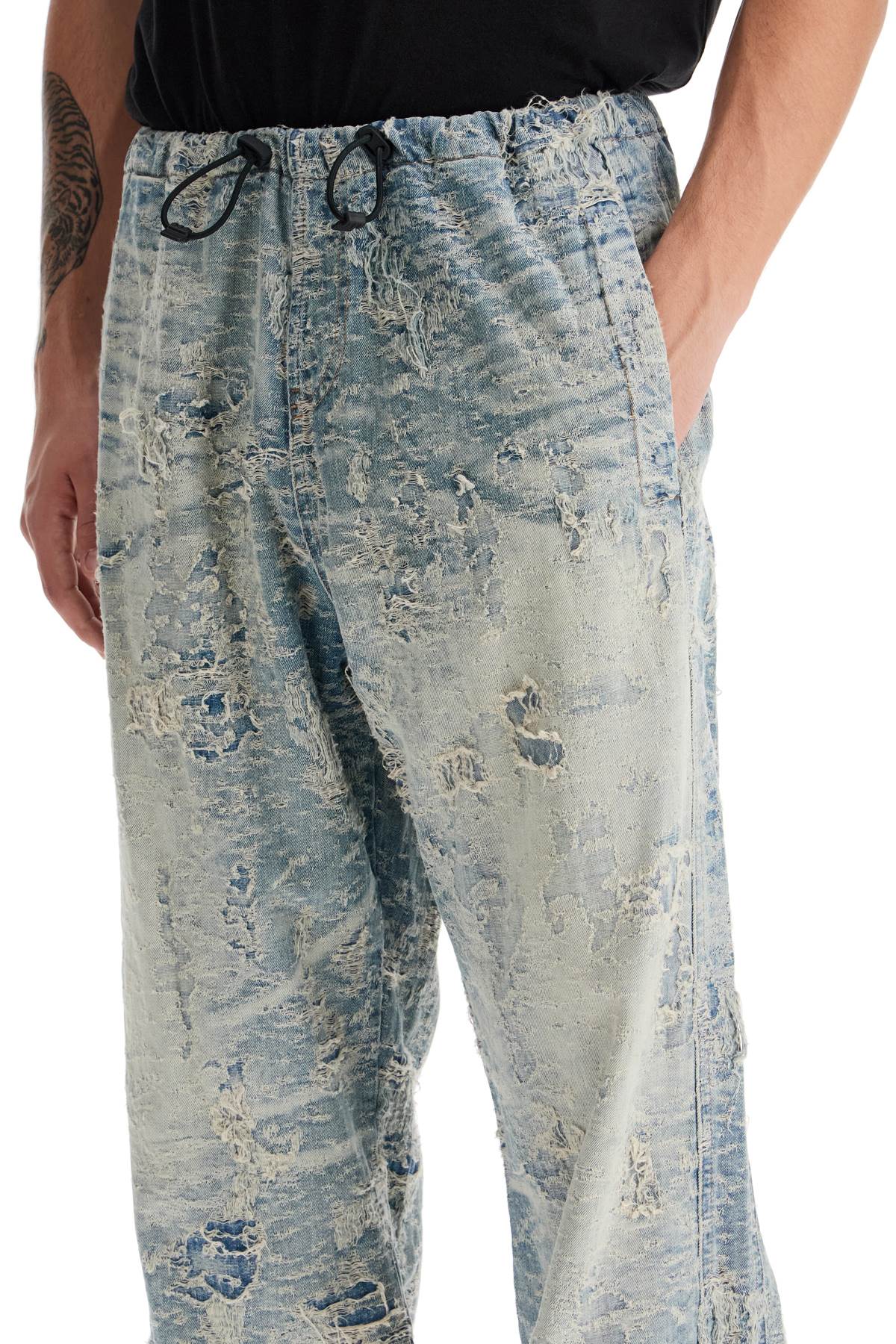 Shop Diesel Distressed Denim Jacquard Pants In Blue