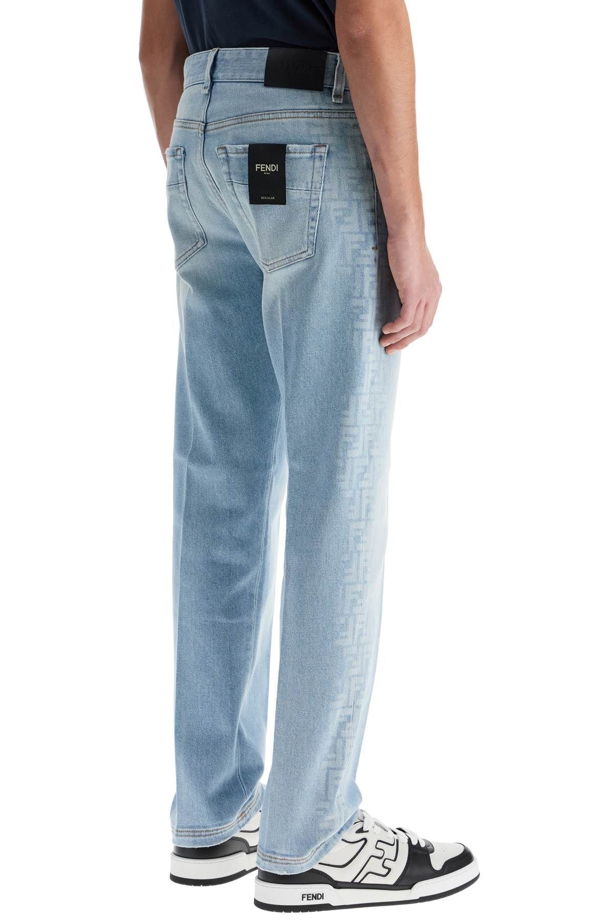 Shop Fendi Faded Ff Pattern Jeans With In Light Blue