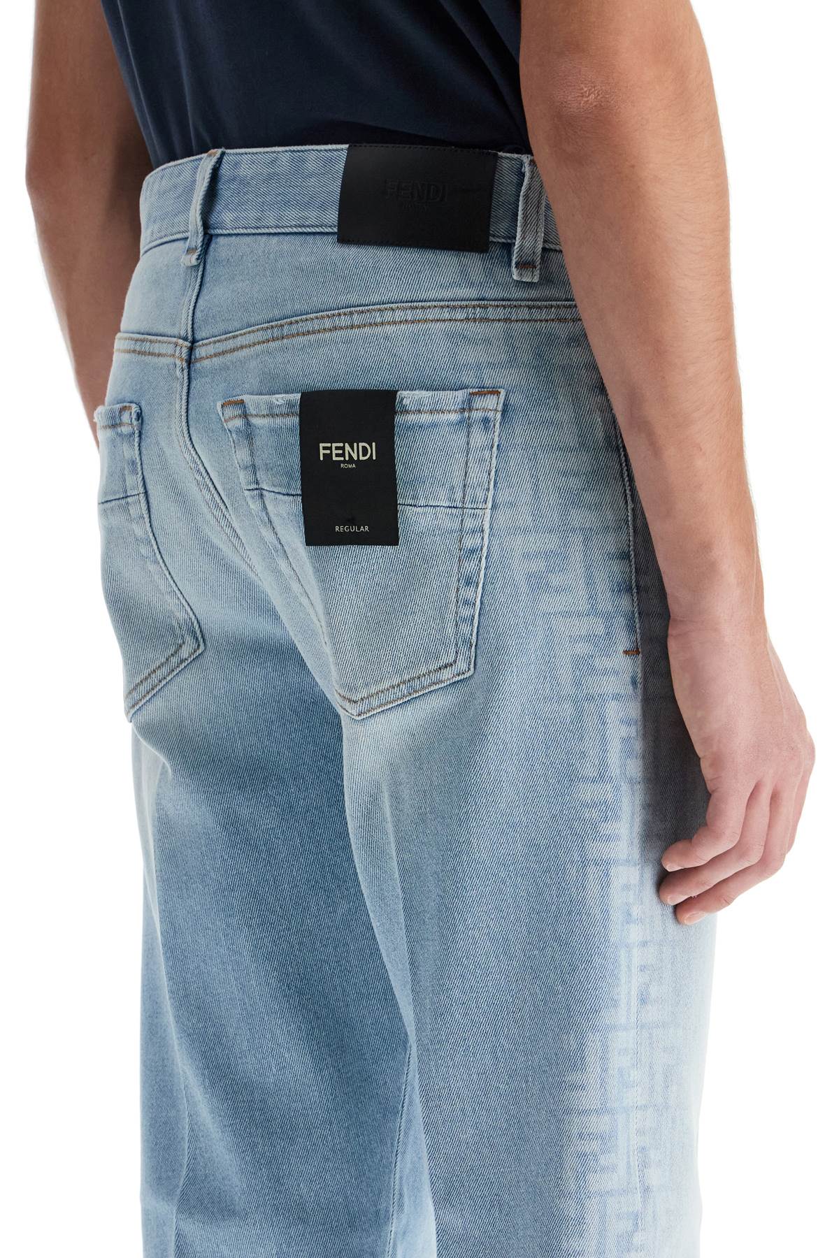 Shop Fendi Faded Ff Pattern Jeans With In Light Blue