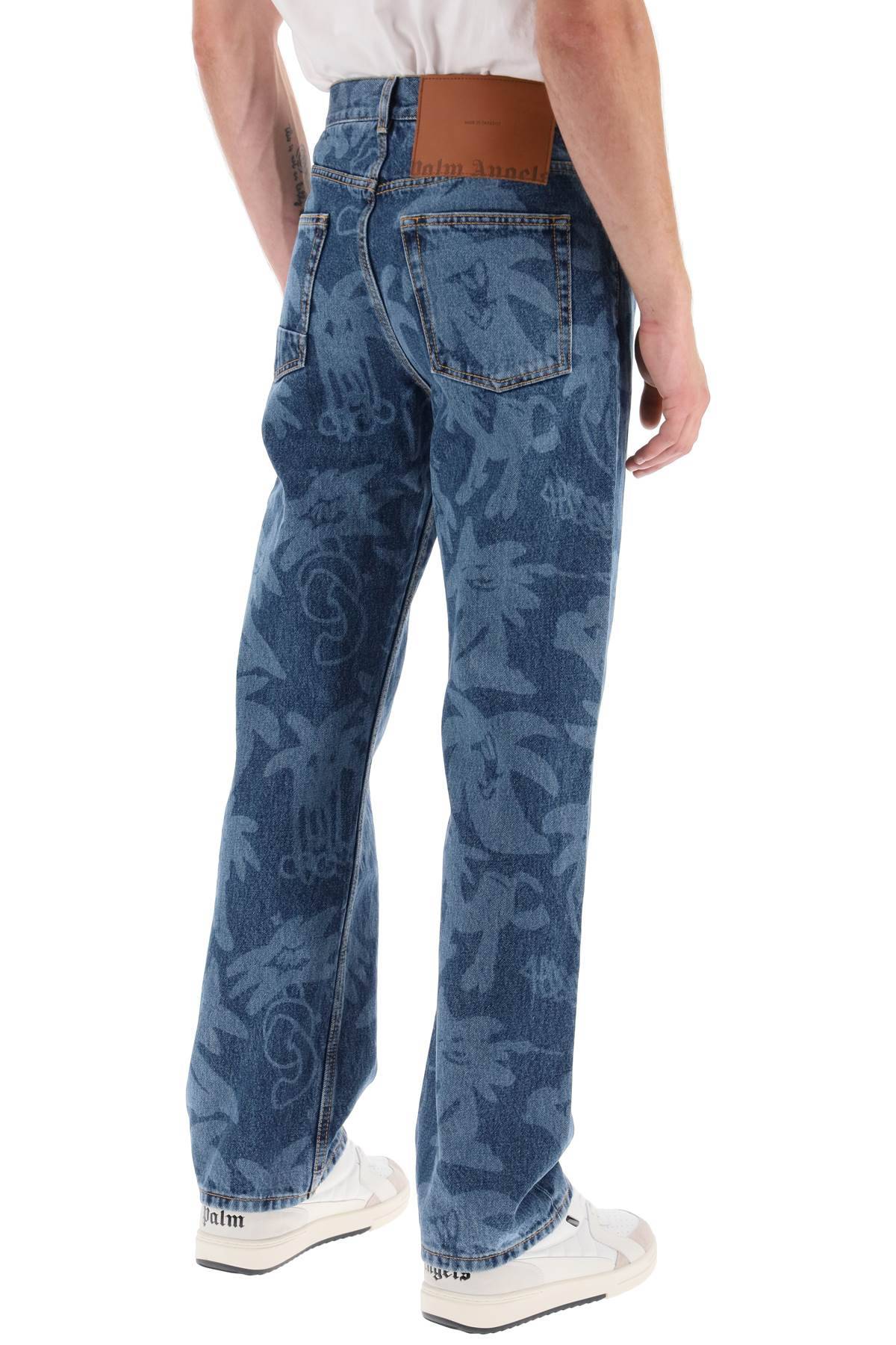 Shop Palm Angels Palmity Allover Laser Denim Jeans In Blue