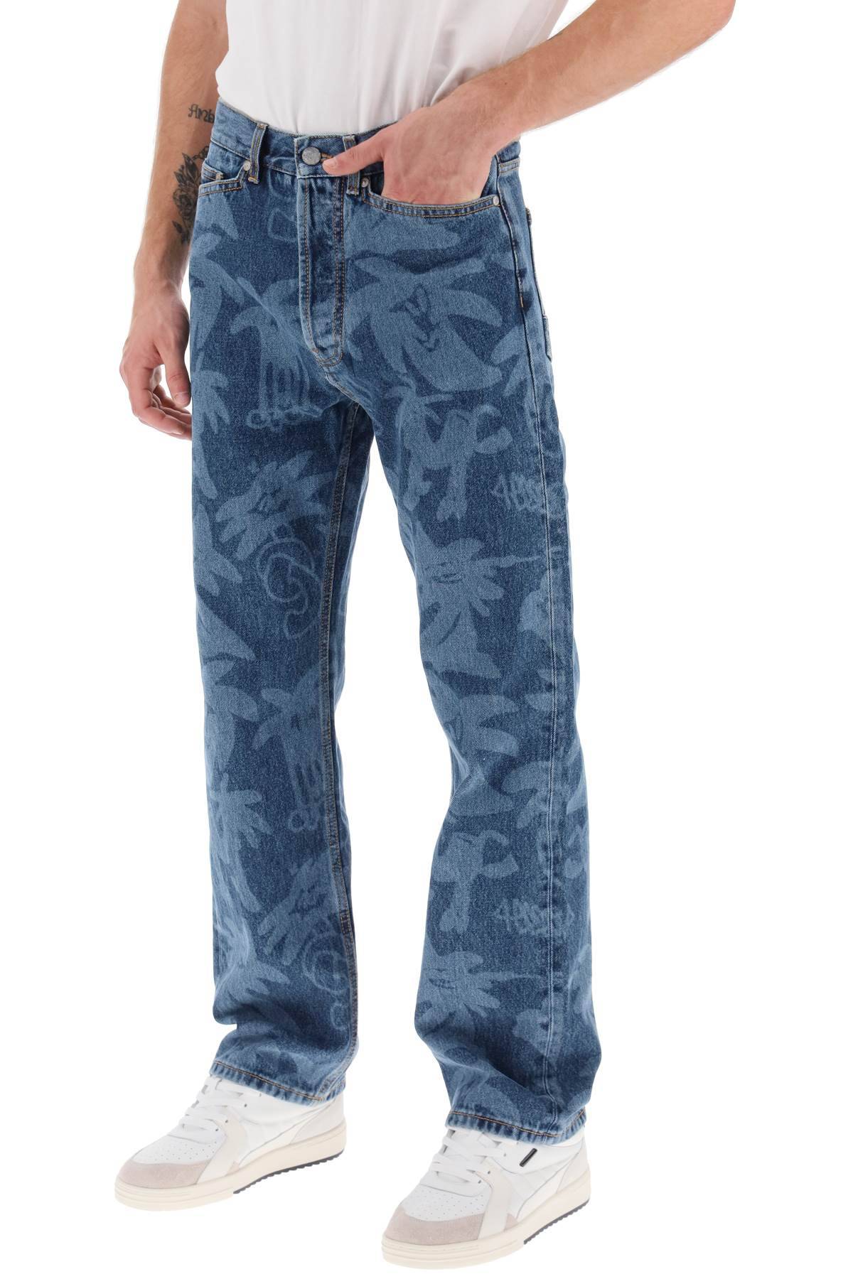 Shop Palm Angels Palmity Allover Laser Denim Jeans In Blue