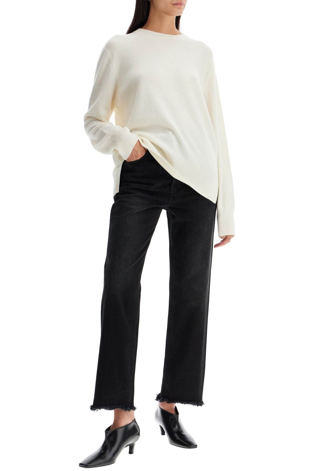 Shop Totême Classic Fit Jeans With Frayed Hemline In Black