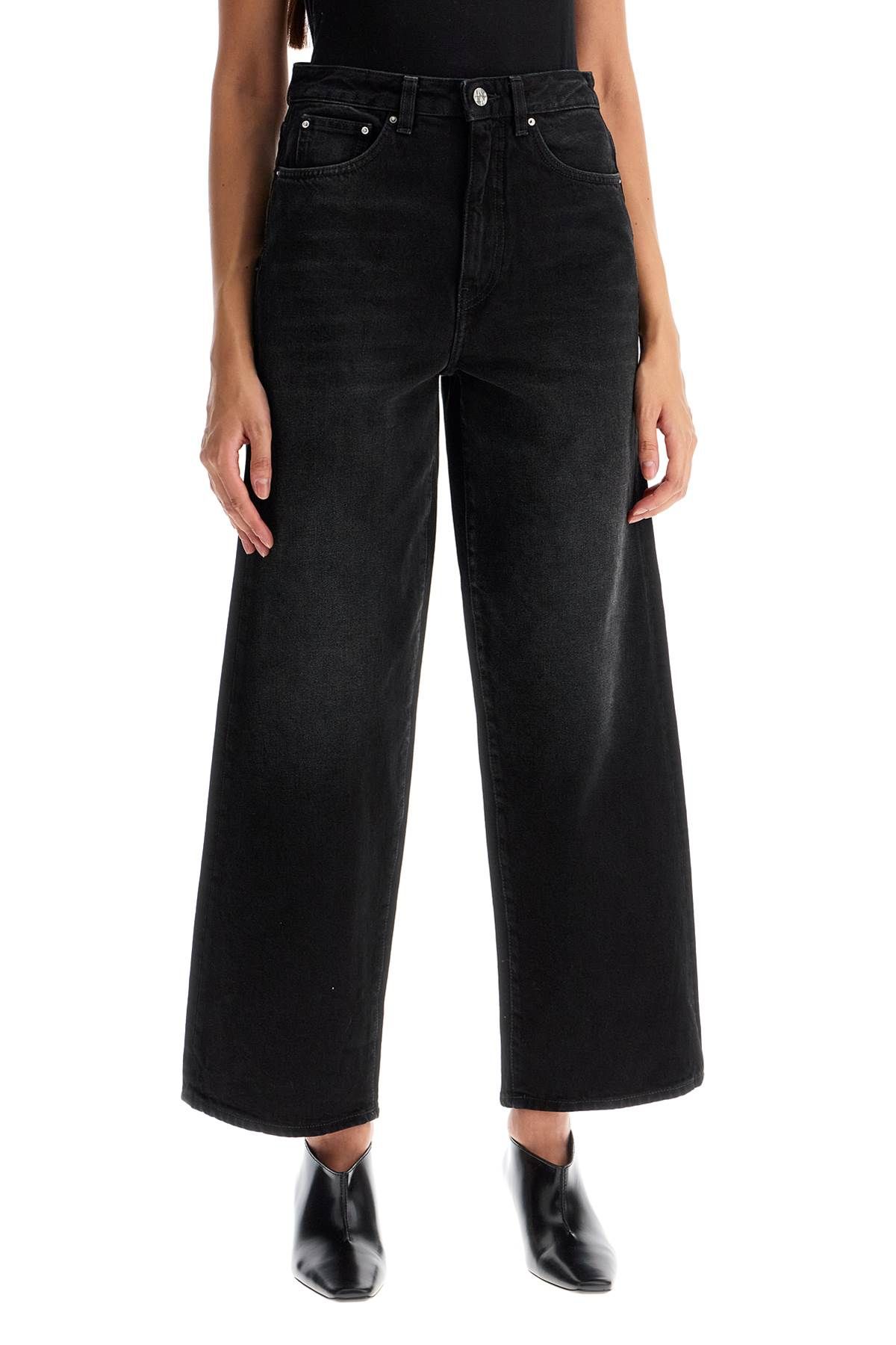 Shop Totême Cropped And Flared Jeans In Black