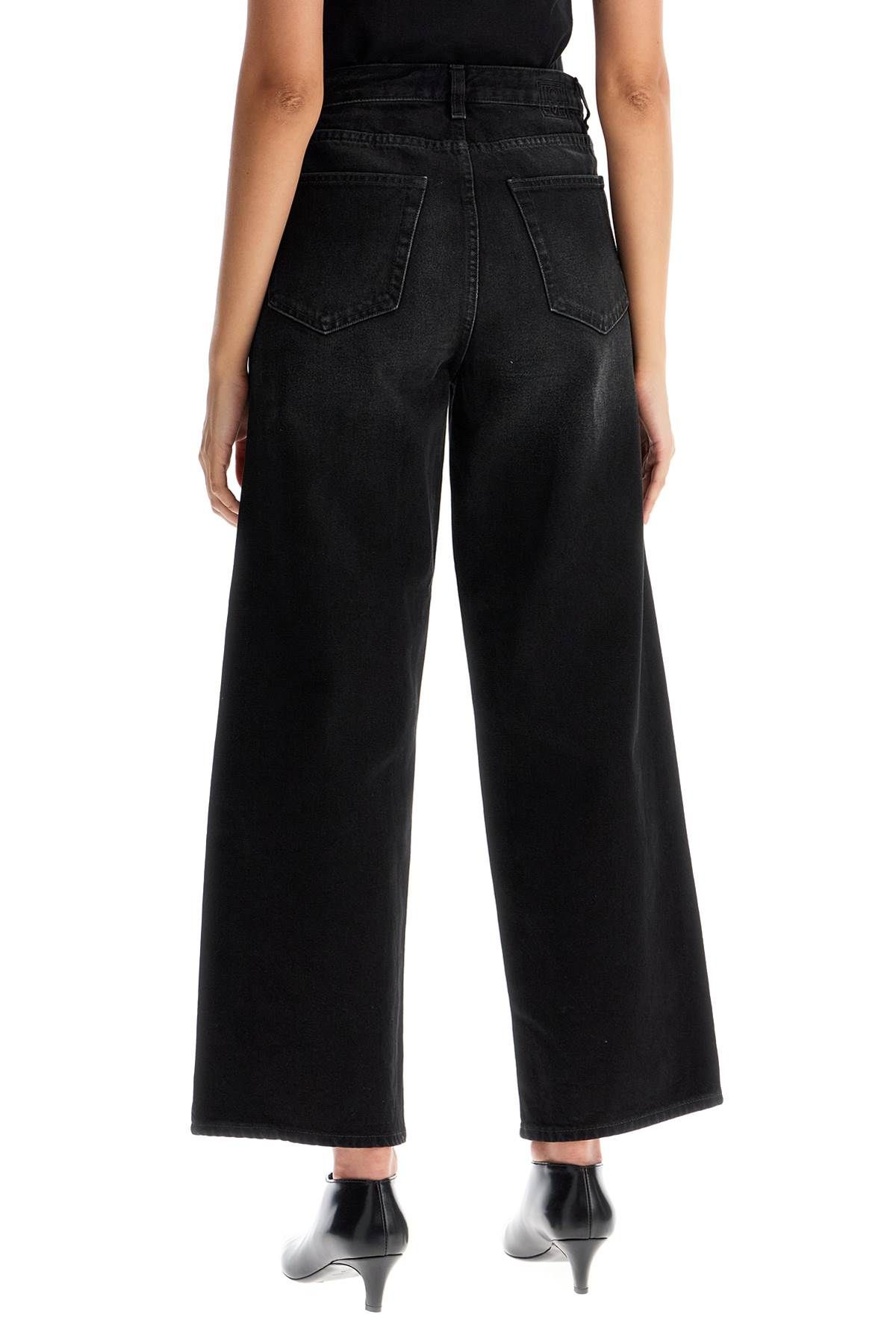 Shop Totême Cropped And Flared Jeans In Black