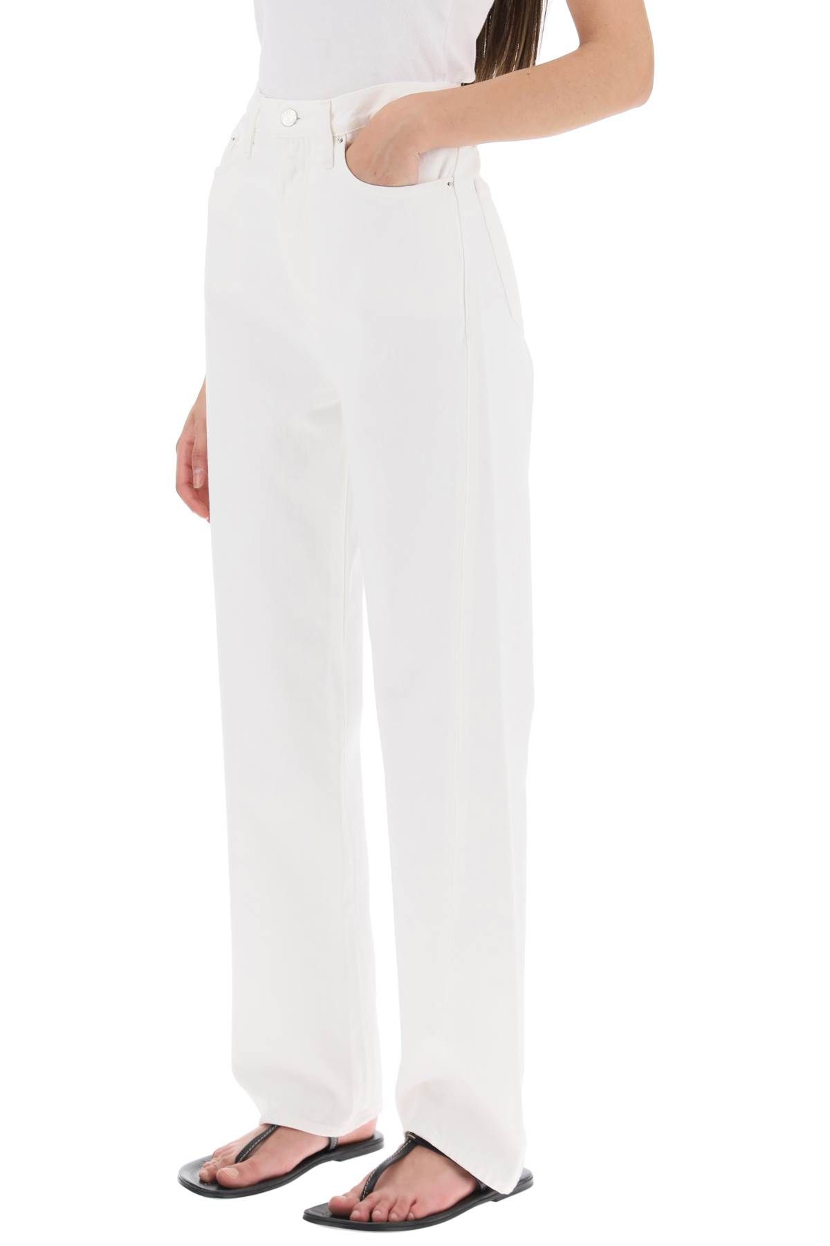 Shop Totême Twisted Seam Straight Jeans In White