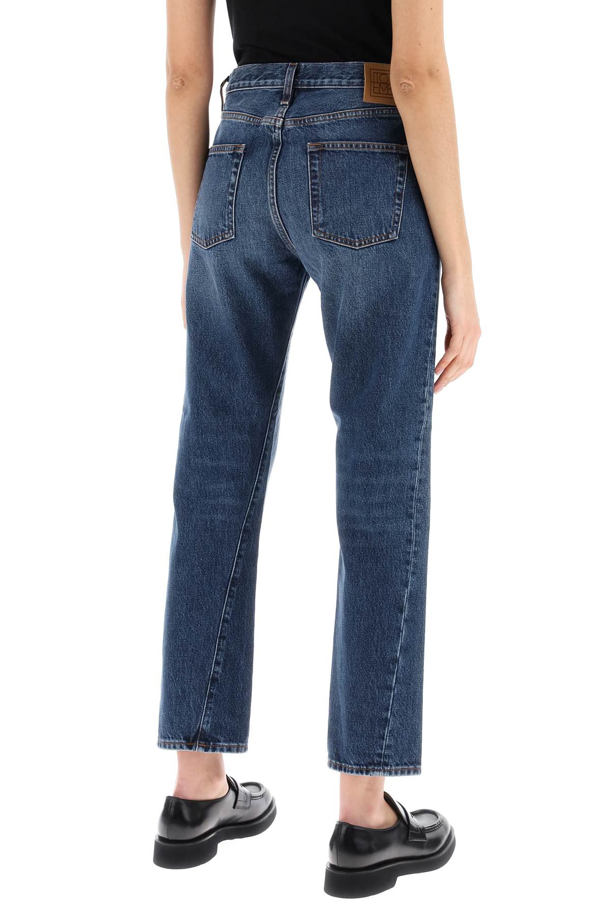 Shop Totême Twisted Seam Straight Jeans In Blue