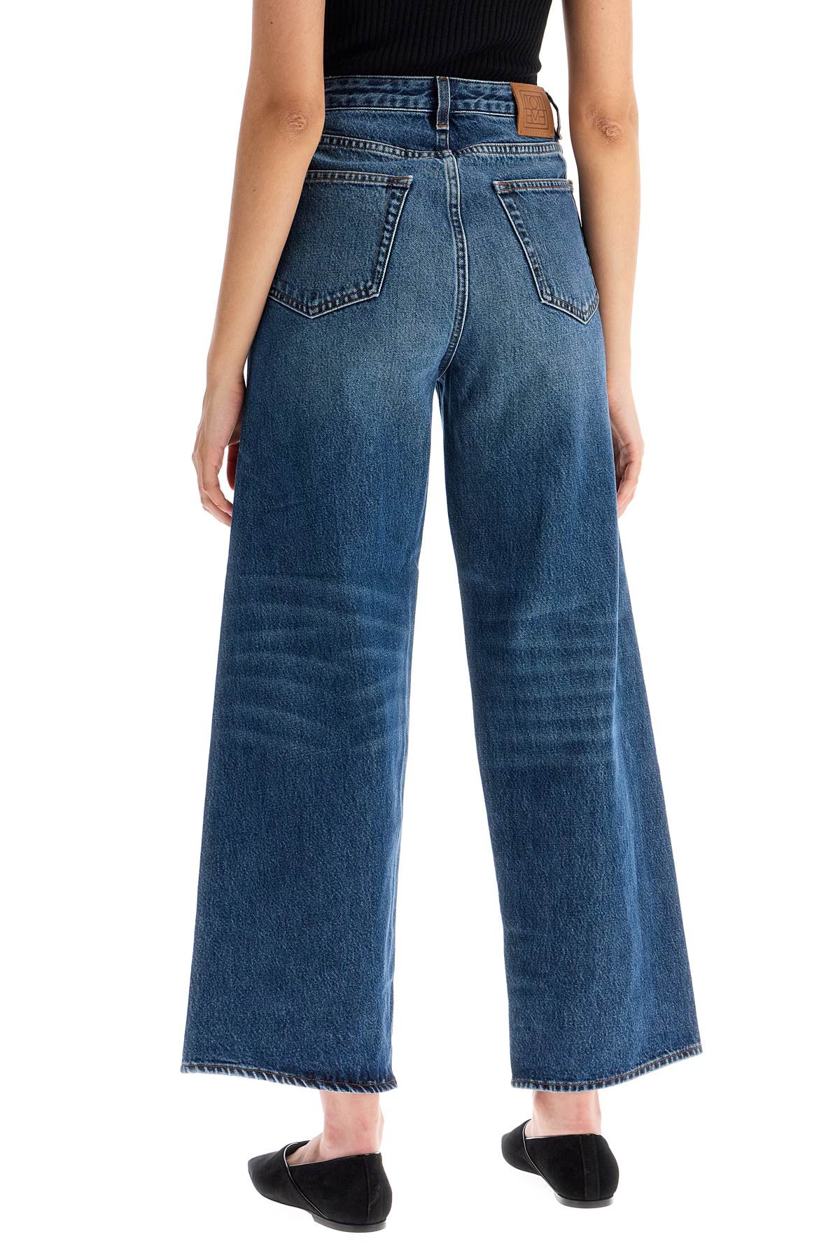 Shop Totême Cropped Flare Jeans In Blue