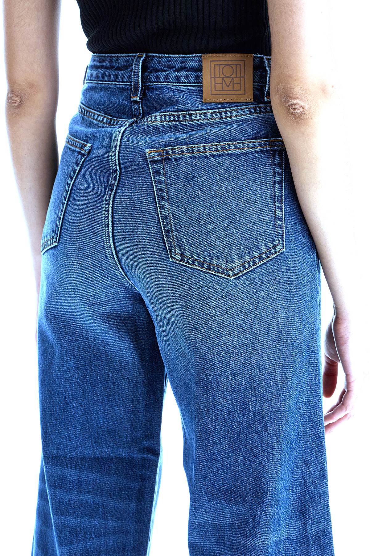 Shop Totême Cropped Flare Jeans In Blue