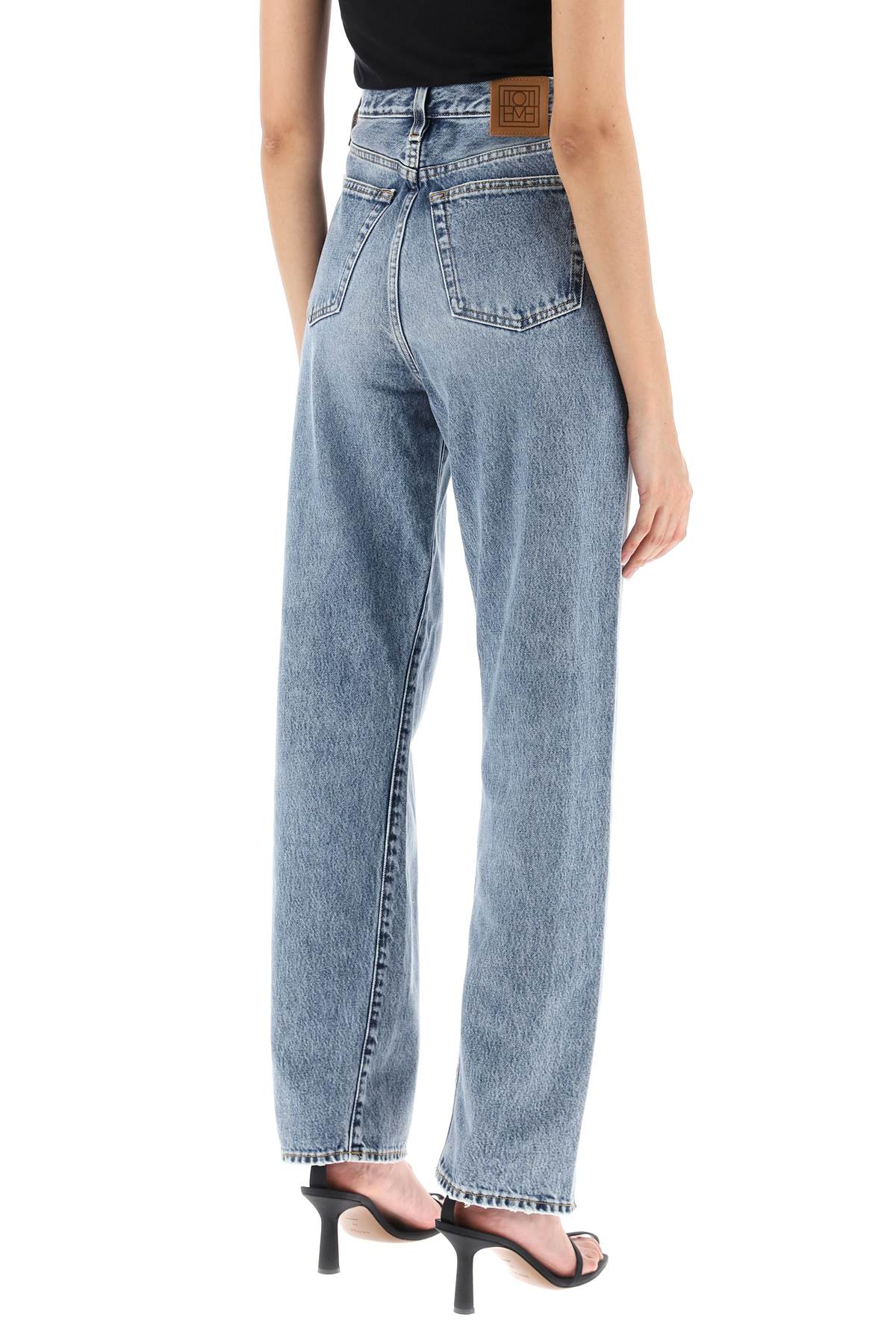 Shop Totême Twisted Seam Straight Jeans In Blue