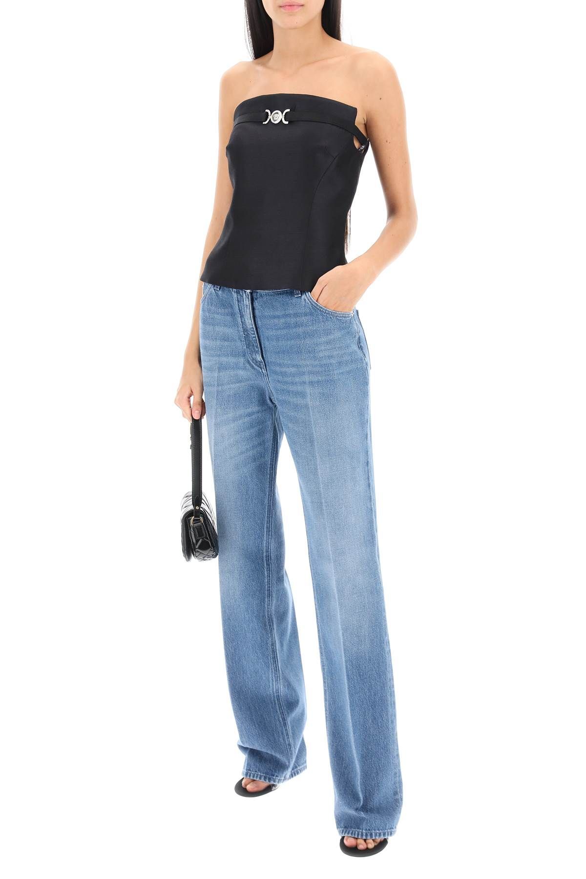 Shop Versace Boyfriend Jeans With Tailored Crease In Blue