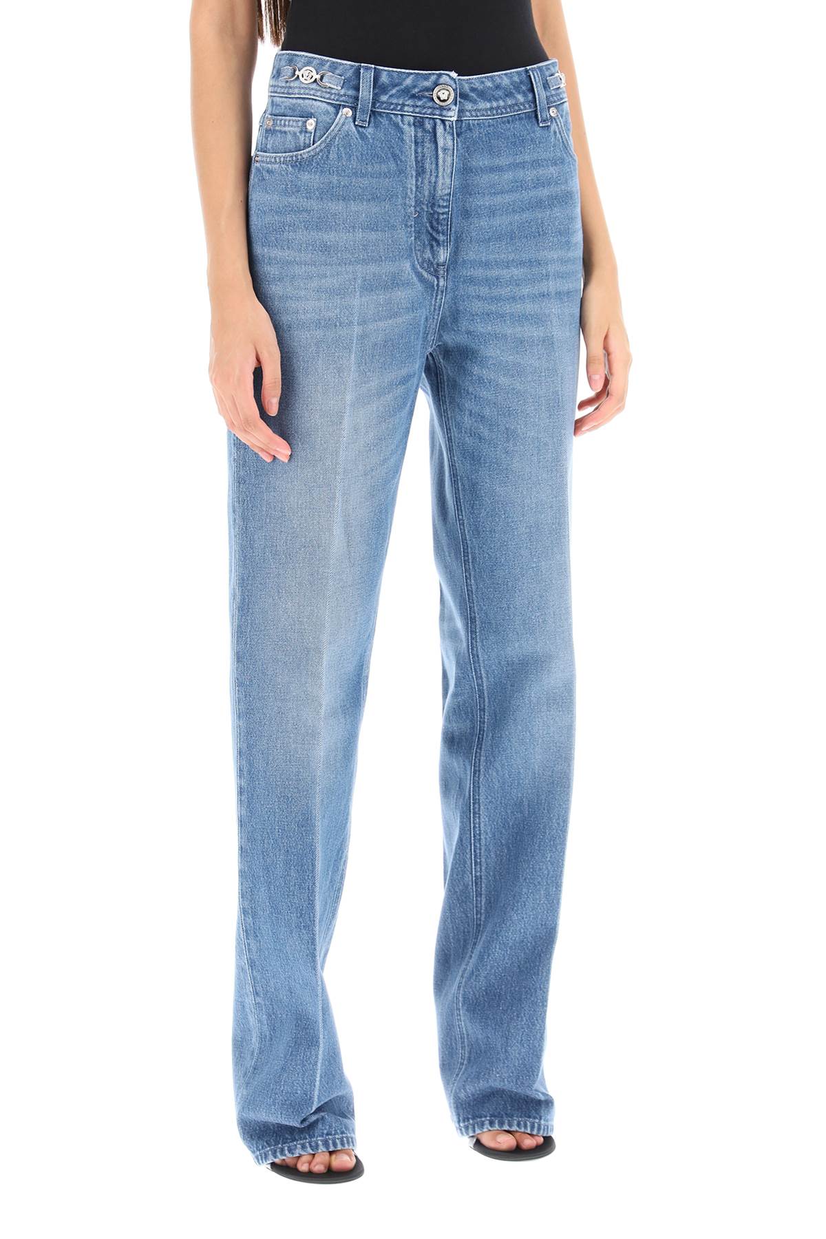 Shop Versace Boyfriend Jeans With Tailored Crease In Blue