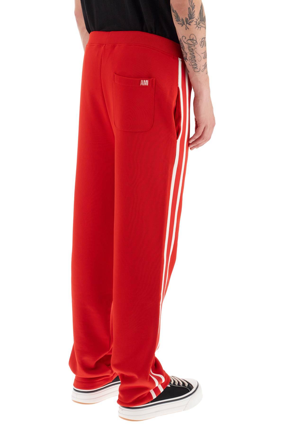 Shop Ami Alexandre Mattiussi Track Pants With Side Bands In Red