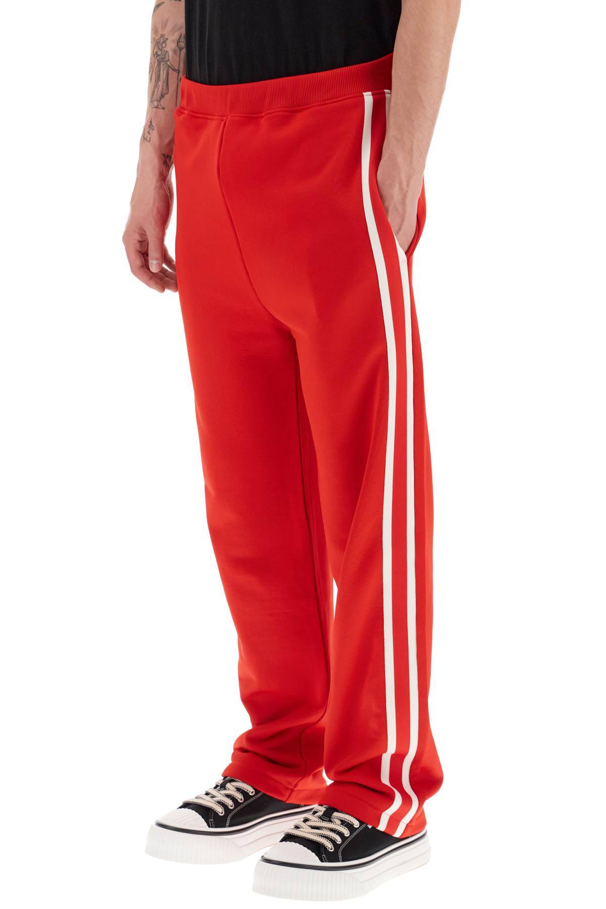 Shop Ami Alexandre Mattiussi Track Pants With Side Bands In Red