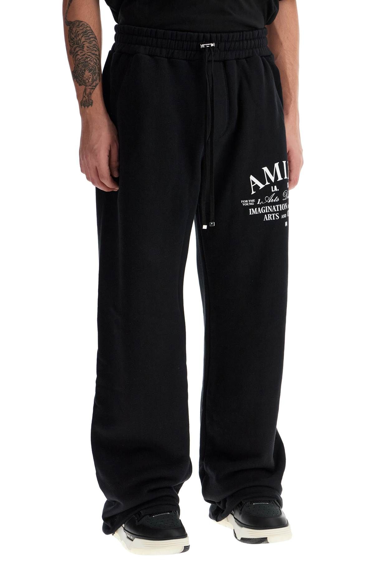 Shop Amiri Arts District Joggers In Black