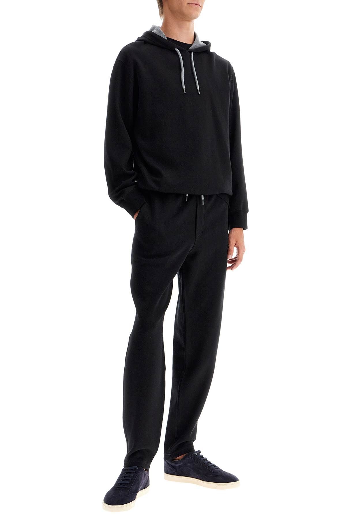 Shop Brunello Cucinelli Interlock Jersey Pants For Men In Black