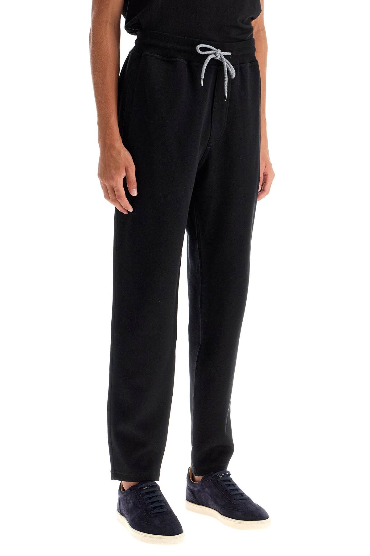 Shop Brunello Cucinelli Interlock Jersey Pants For Men In Black