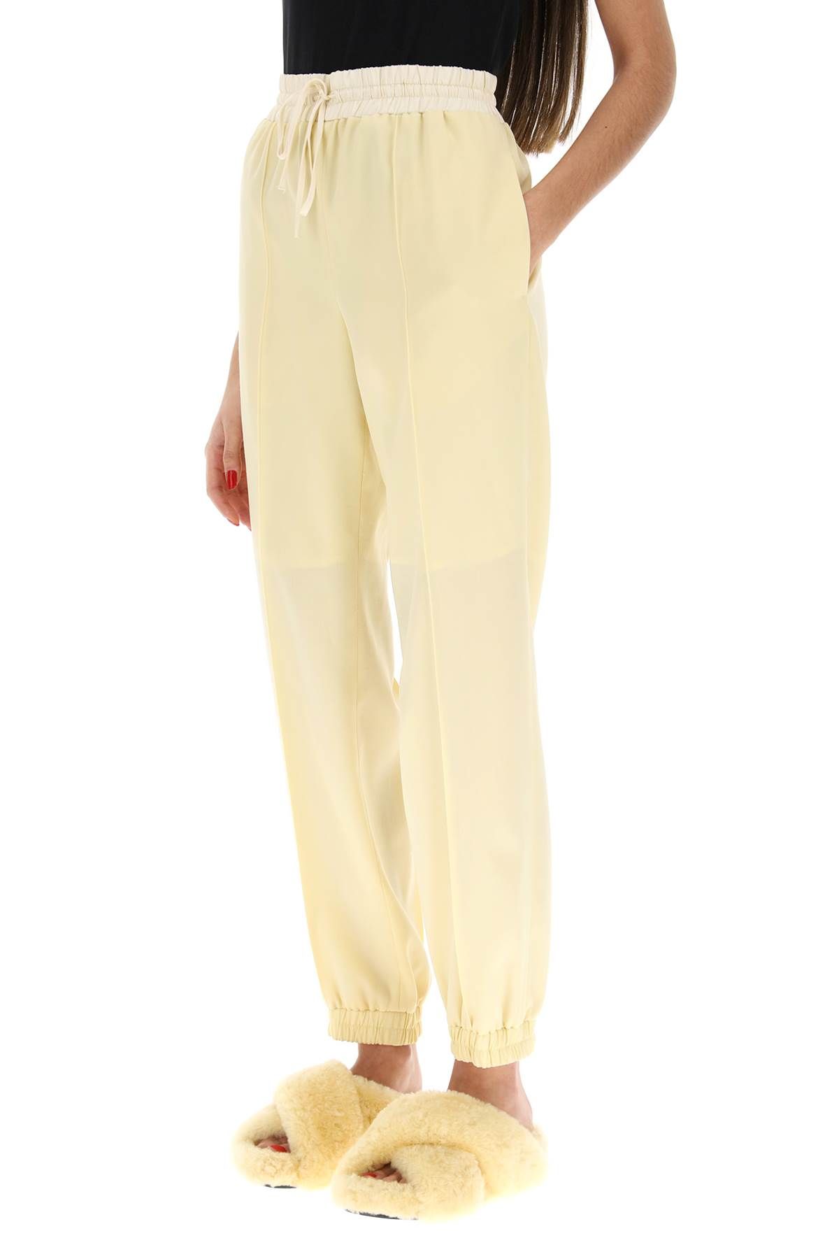 Shop Jil Sander Virgin Wool Jogger Pants In Yellow