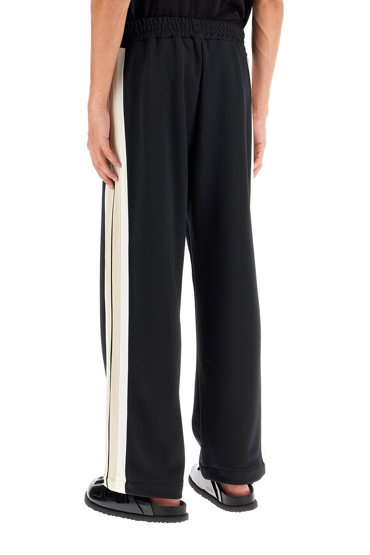 Shop Palm Angels Contrast Band Joggers With Track In In Black