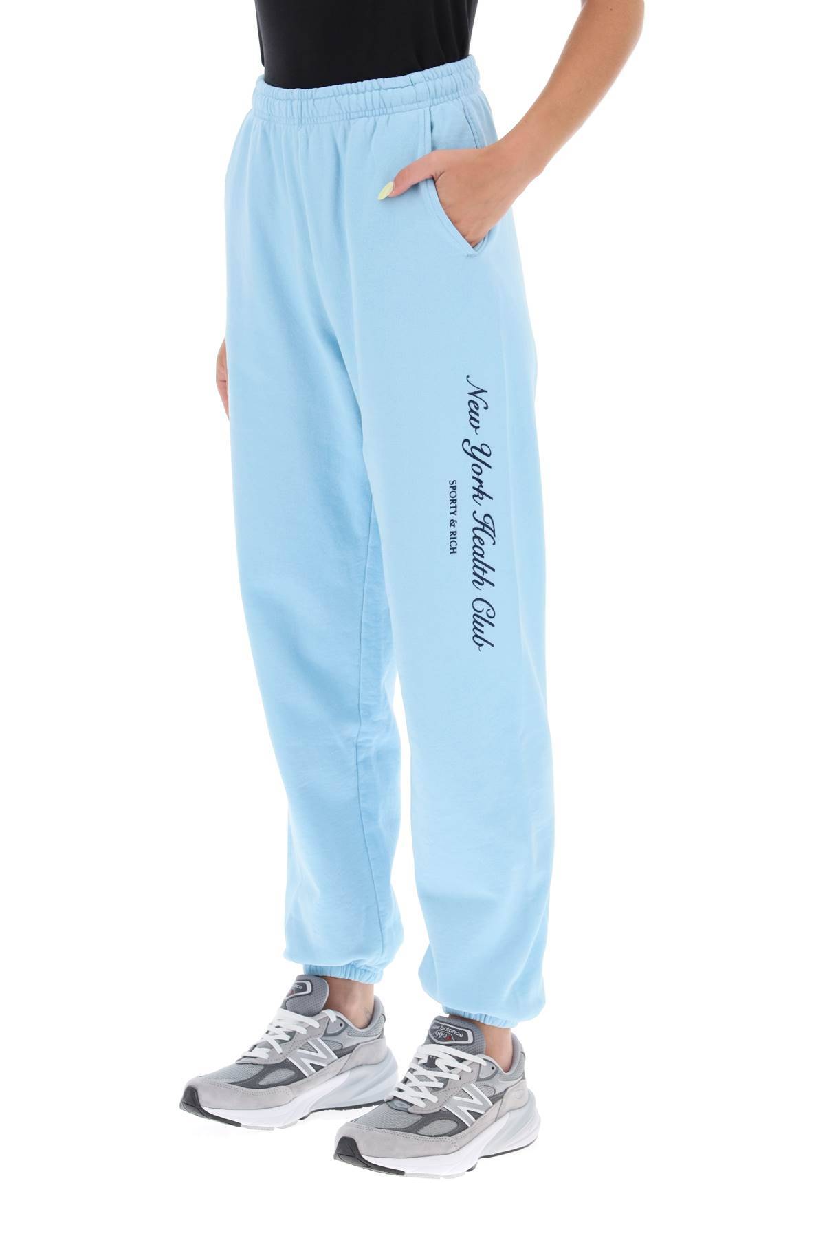Shop Sporty And Rich 'ny Health Club' Flocked Sweatpants In Light Blue