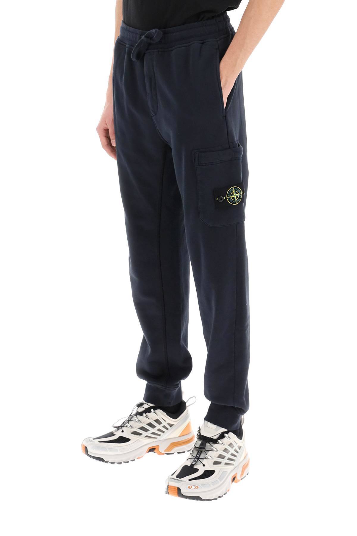 Shop Stone Island Tapered Sweatpants With Leg Pocket In Blue