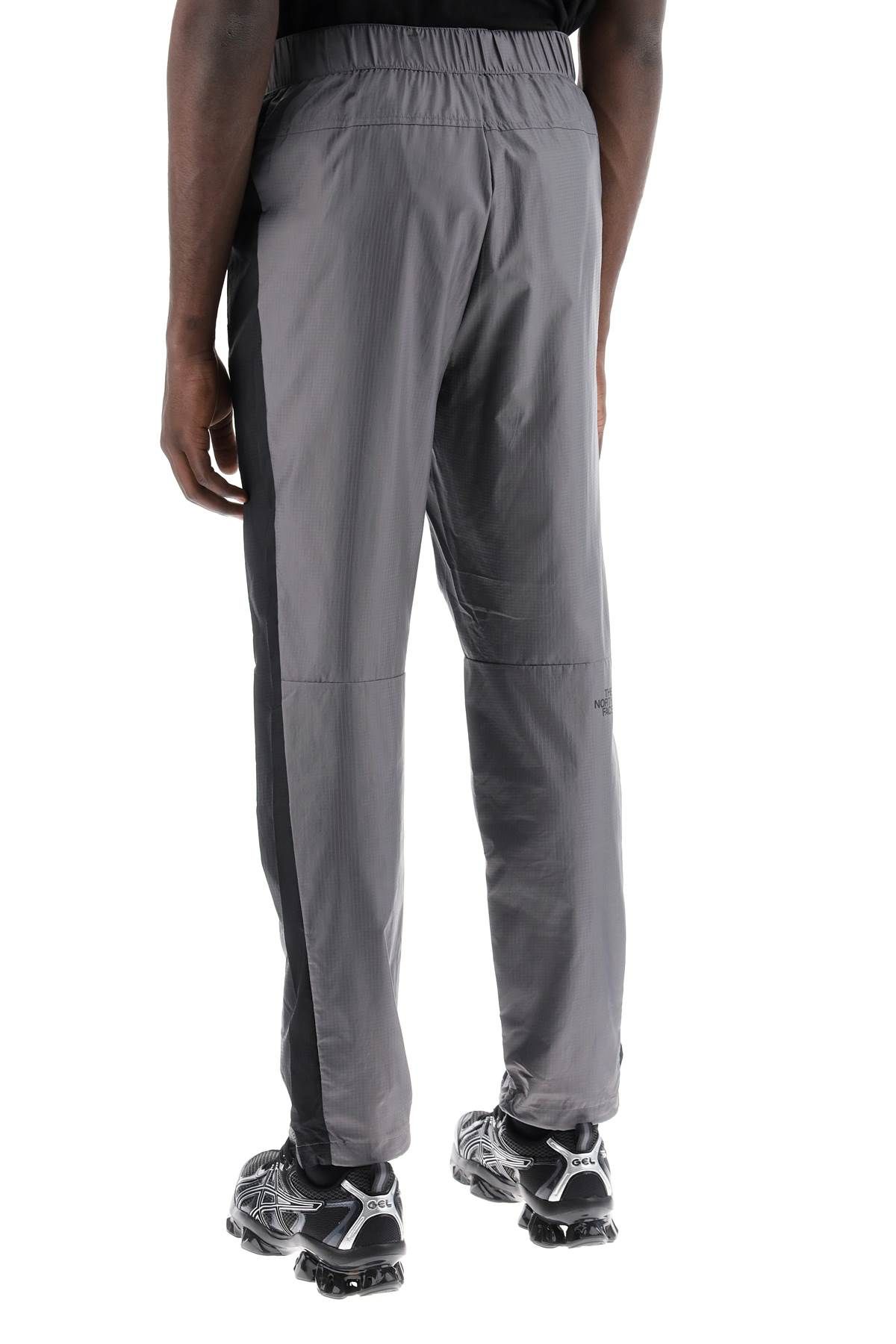 Shop The North Face Nylon Ripstop Wind Shell Joggers In Grey