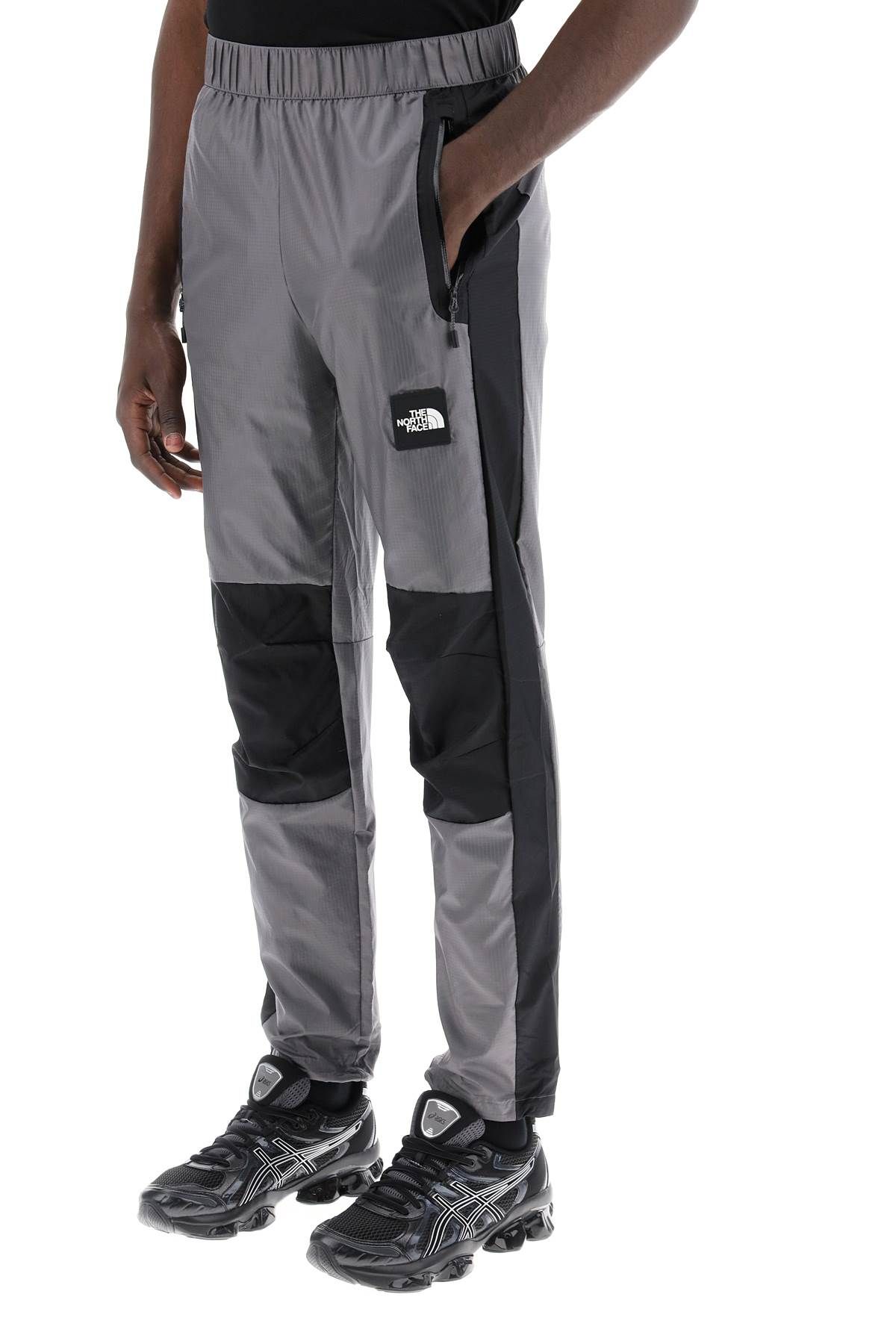 Shop The North Face Nylon Ripstop Wind Shell Joggers In Grey
