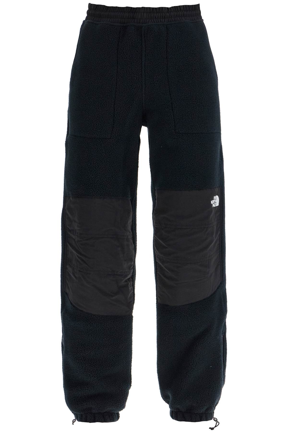 Shop The North Face Retro Denali Fleece Sports Pants. In Black