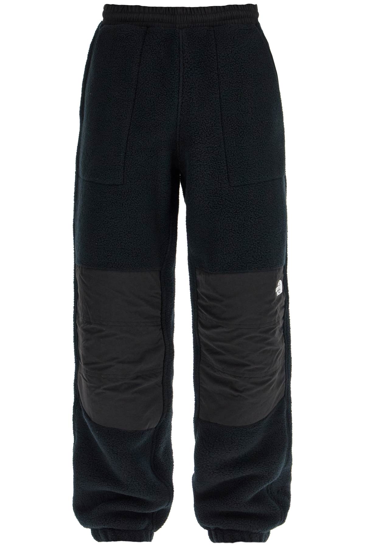 Shop The North Face Retro Denali Fleece Sports Pants. In Black