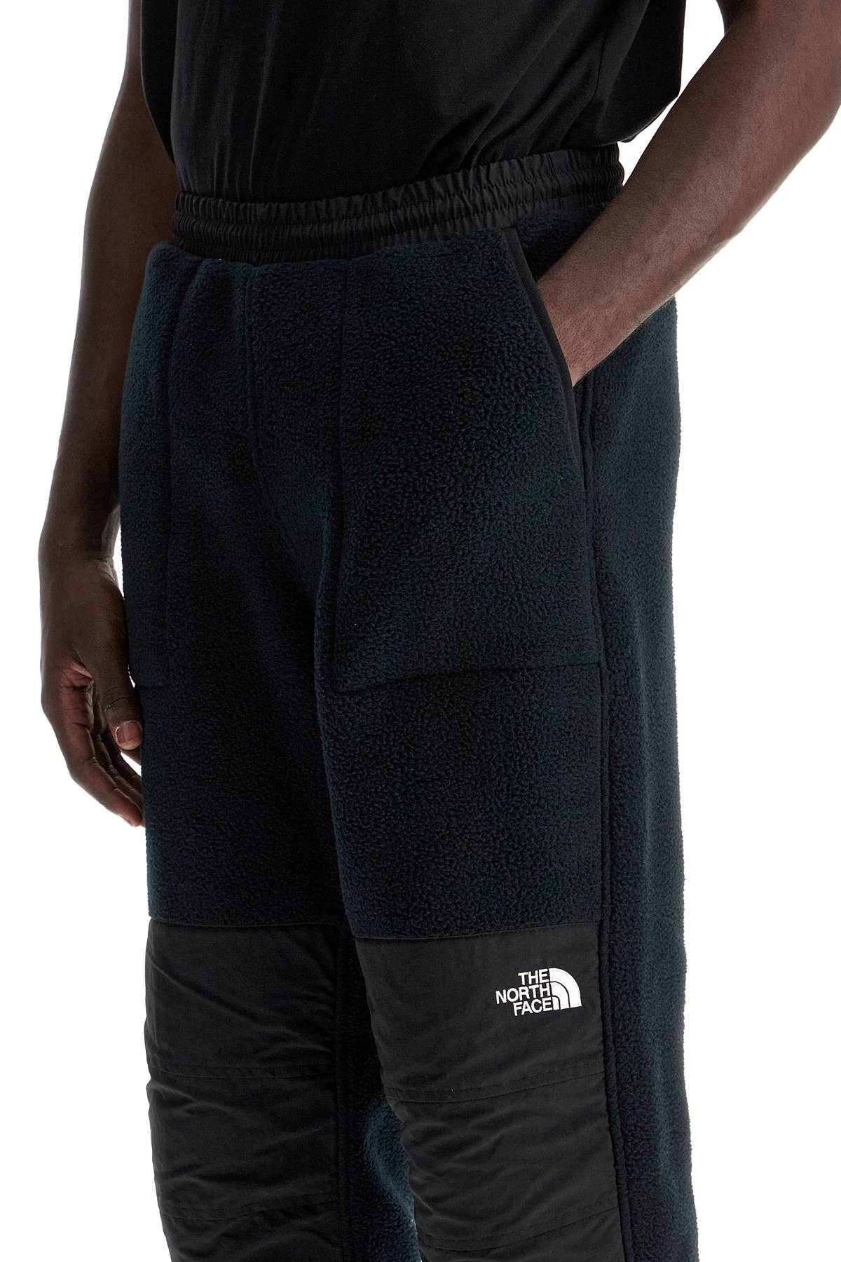 Shop The North Face Retro Denali Fleece Sports Pants. In Black