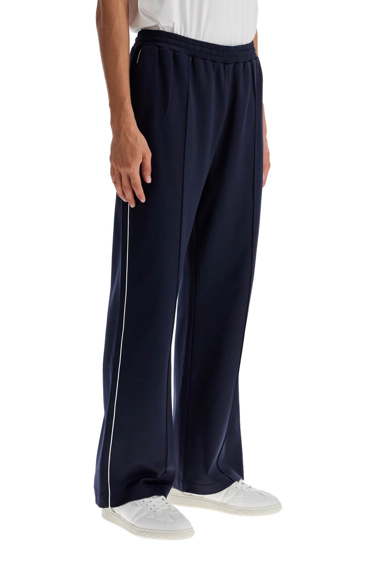 Shop Valentino Jogger Pants With Metallic V Detail In Blue