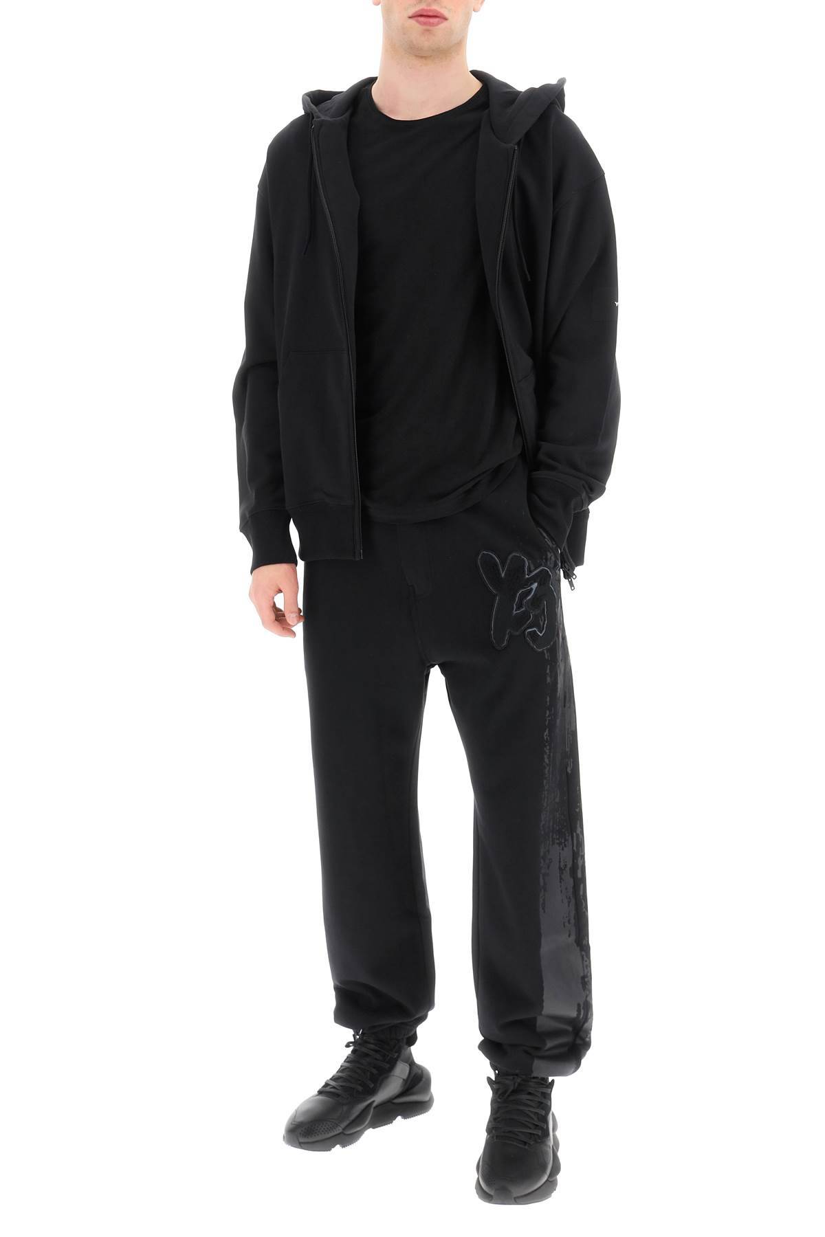 Shop Y-3 Jogger Pants With Coated Detail In Black