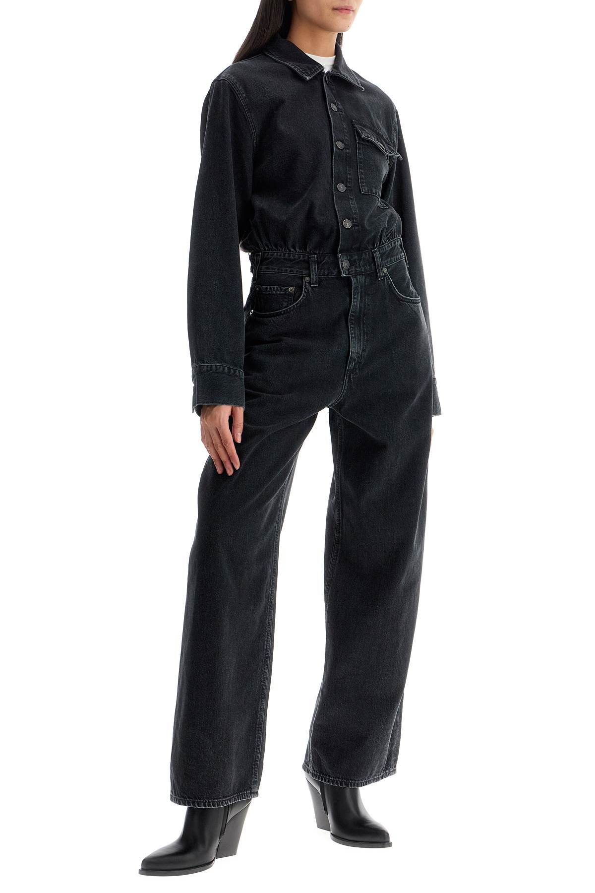 Shop Agolde Denim Tane Jumpsuit In Black