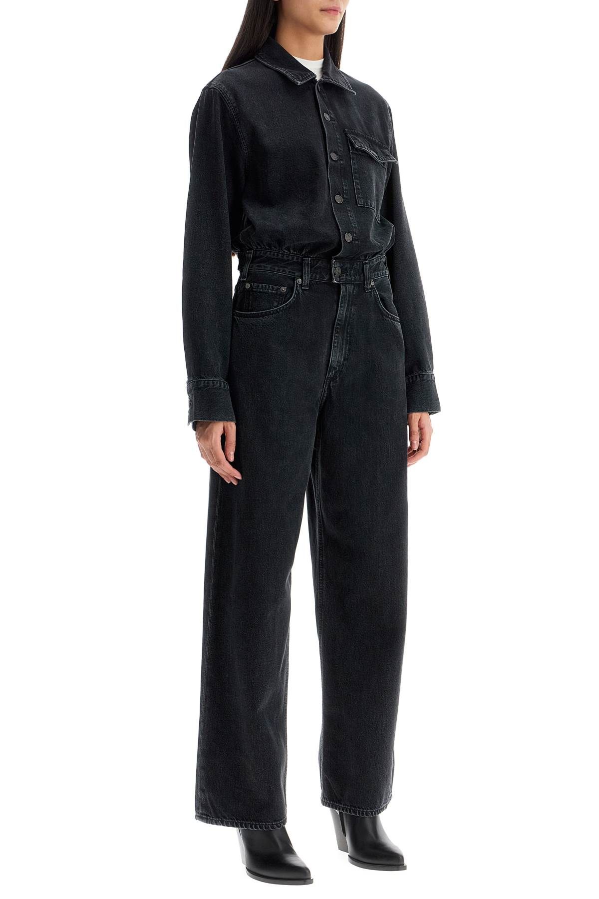 Shop Agolde Denim Tane Jumpsuit In Black