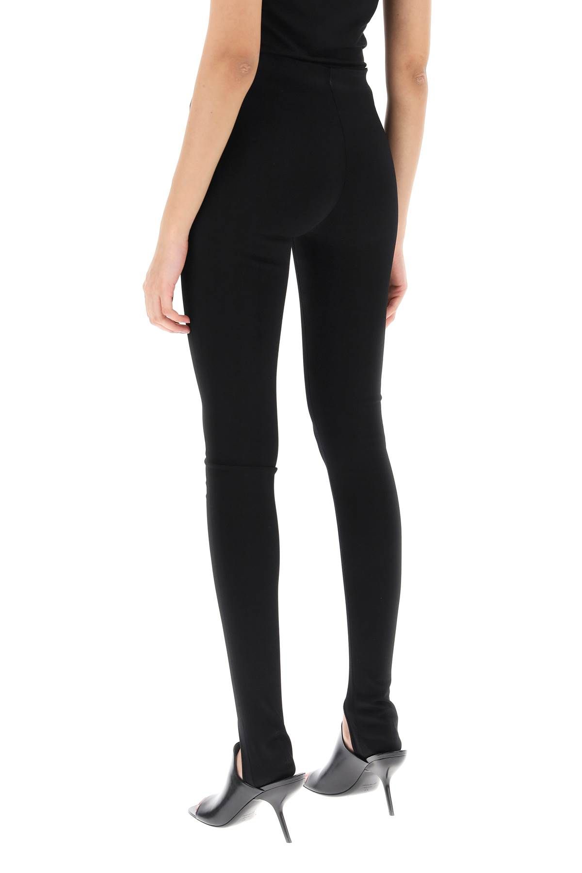 Shop Alaïa Over Heel Leggings In Black