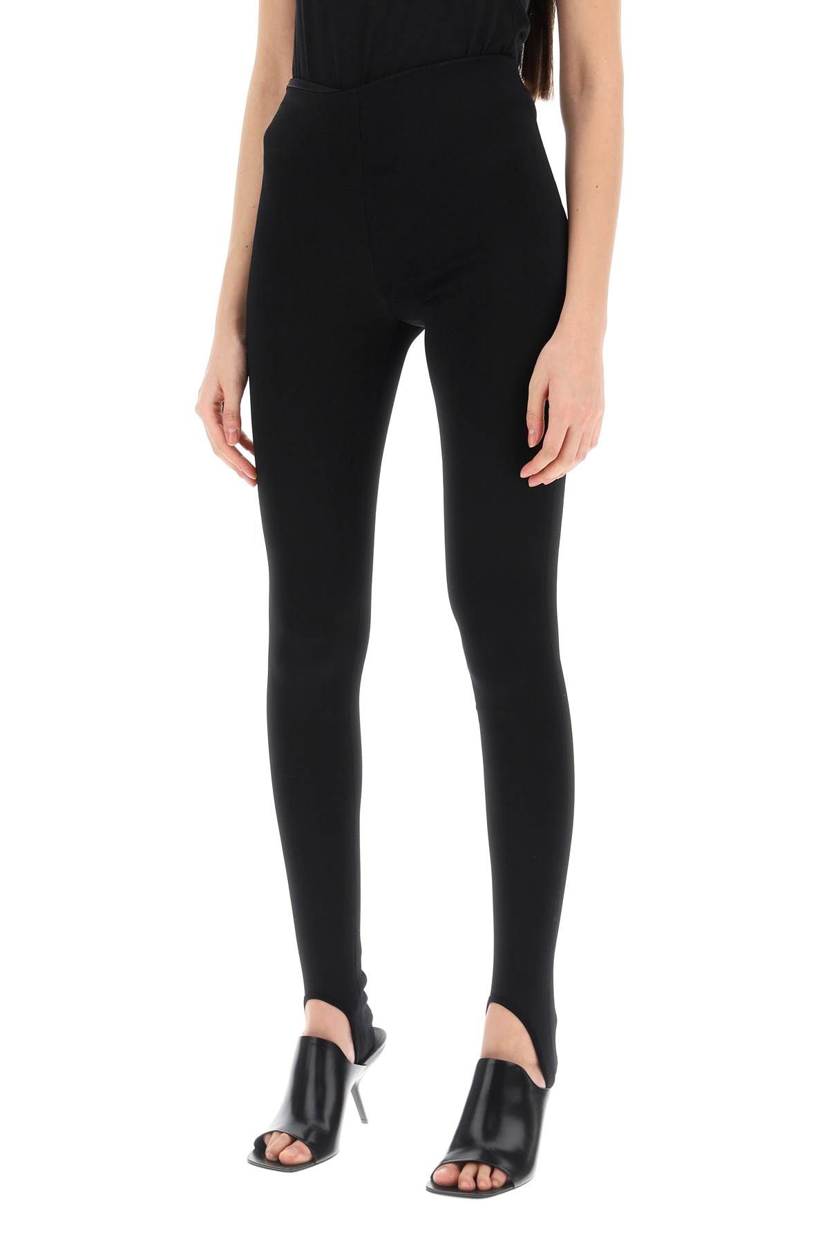 Shop Alaïa Over Heel Leggings In Black